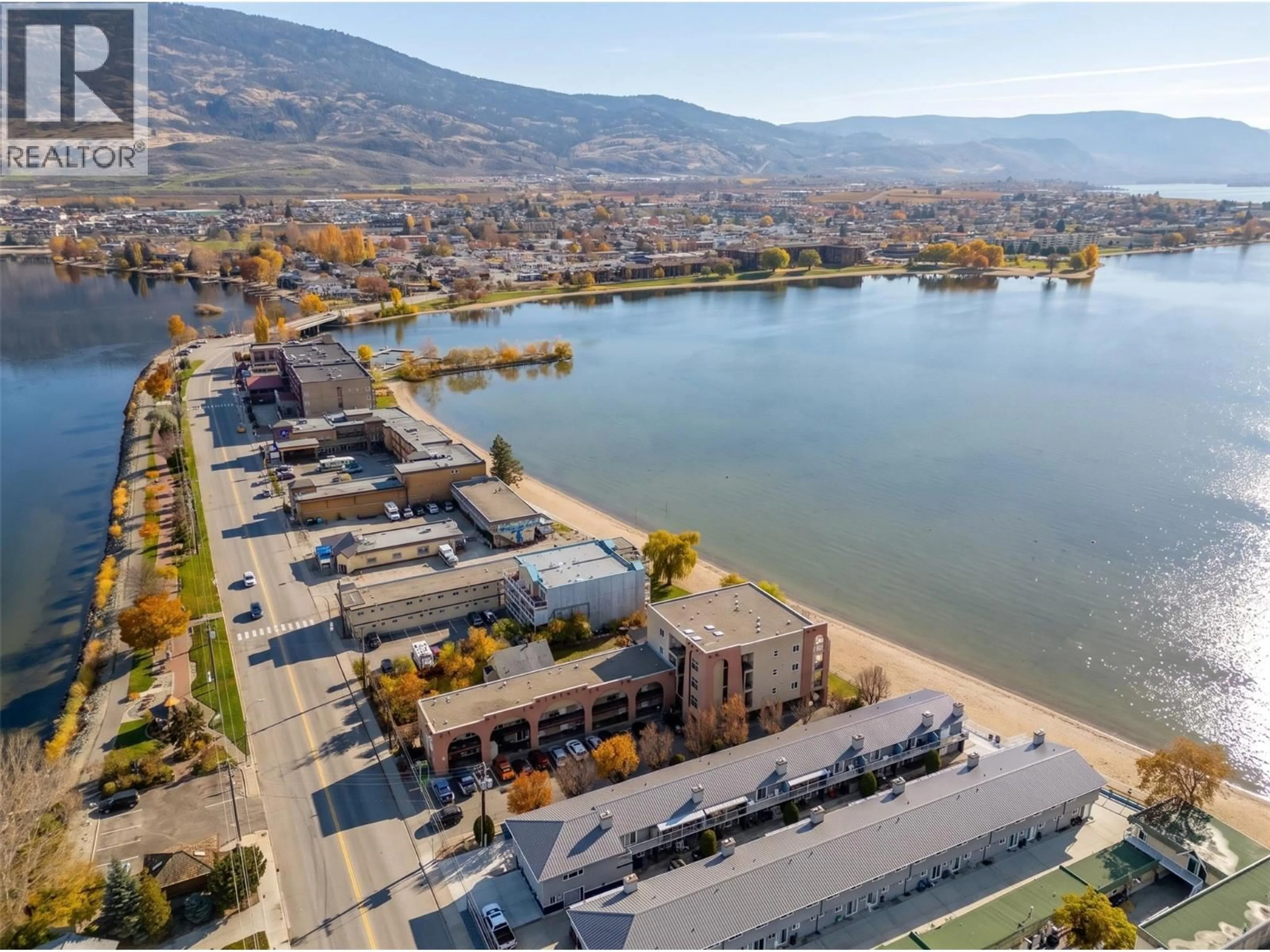 A pic from outside/outdoor area/front of a property/back of a property/a pic from drone, water/lake/river/ocean view for 207 - 7310 MAIN STREET, Osoyoos British Columbia V0H1V0