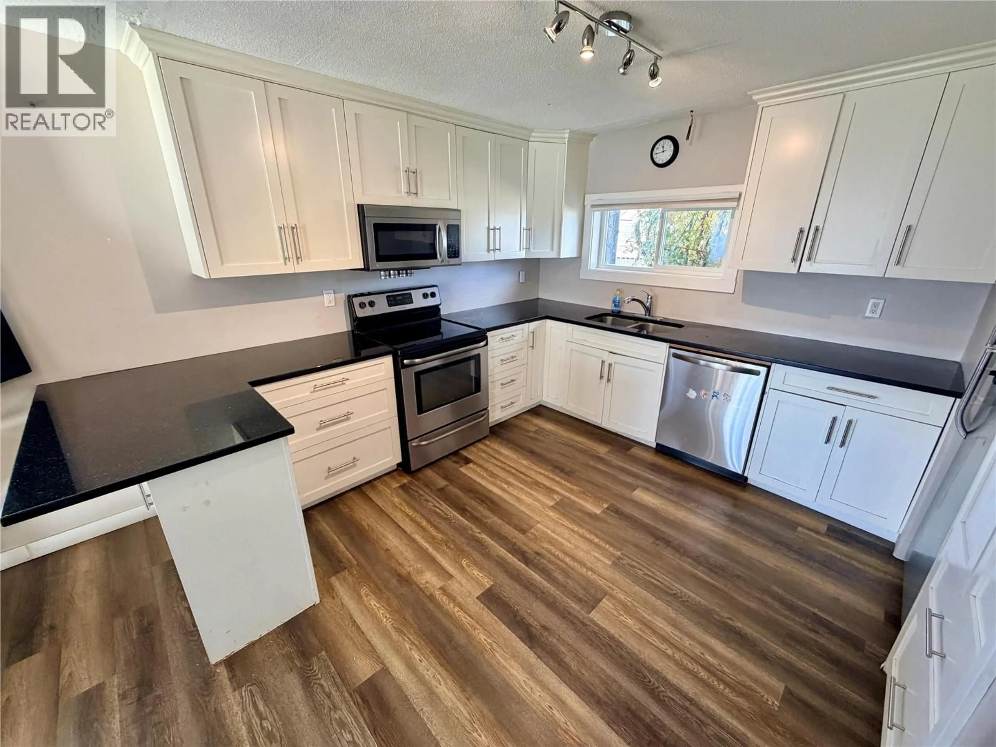 Open concept kitchen, unknown for 5007 48 AVENUE, Pouce Coupe British Columbia V0C2C0