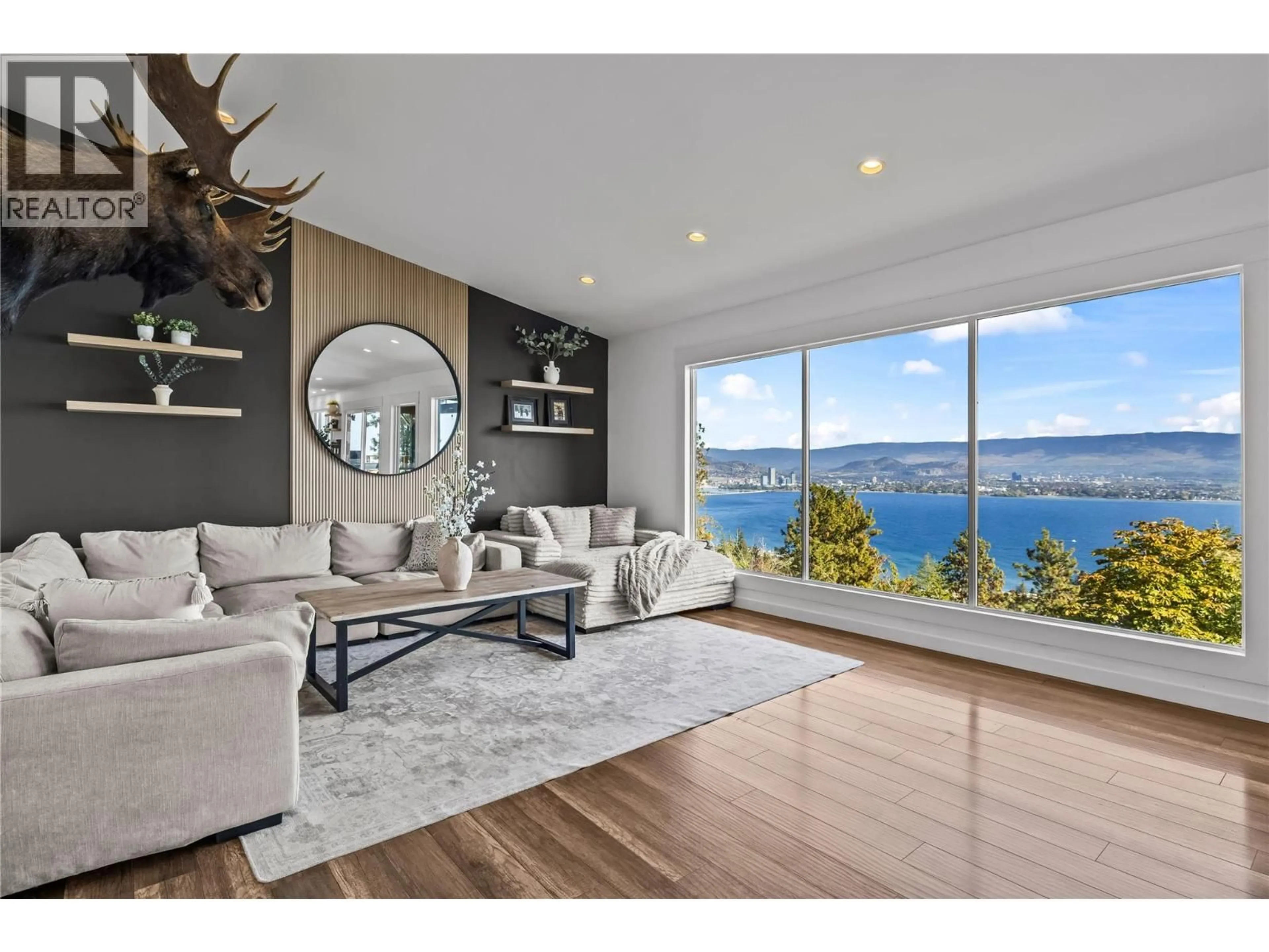 Living room with furniture, wood/laminate floor for 2751 LAKEVIEW ROAD, West Kelowna British Columbia V1Z1Y5