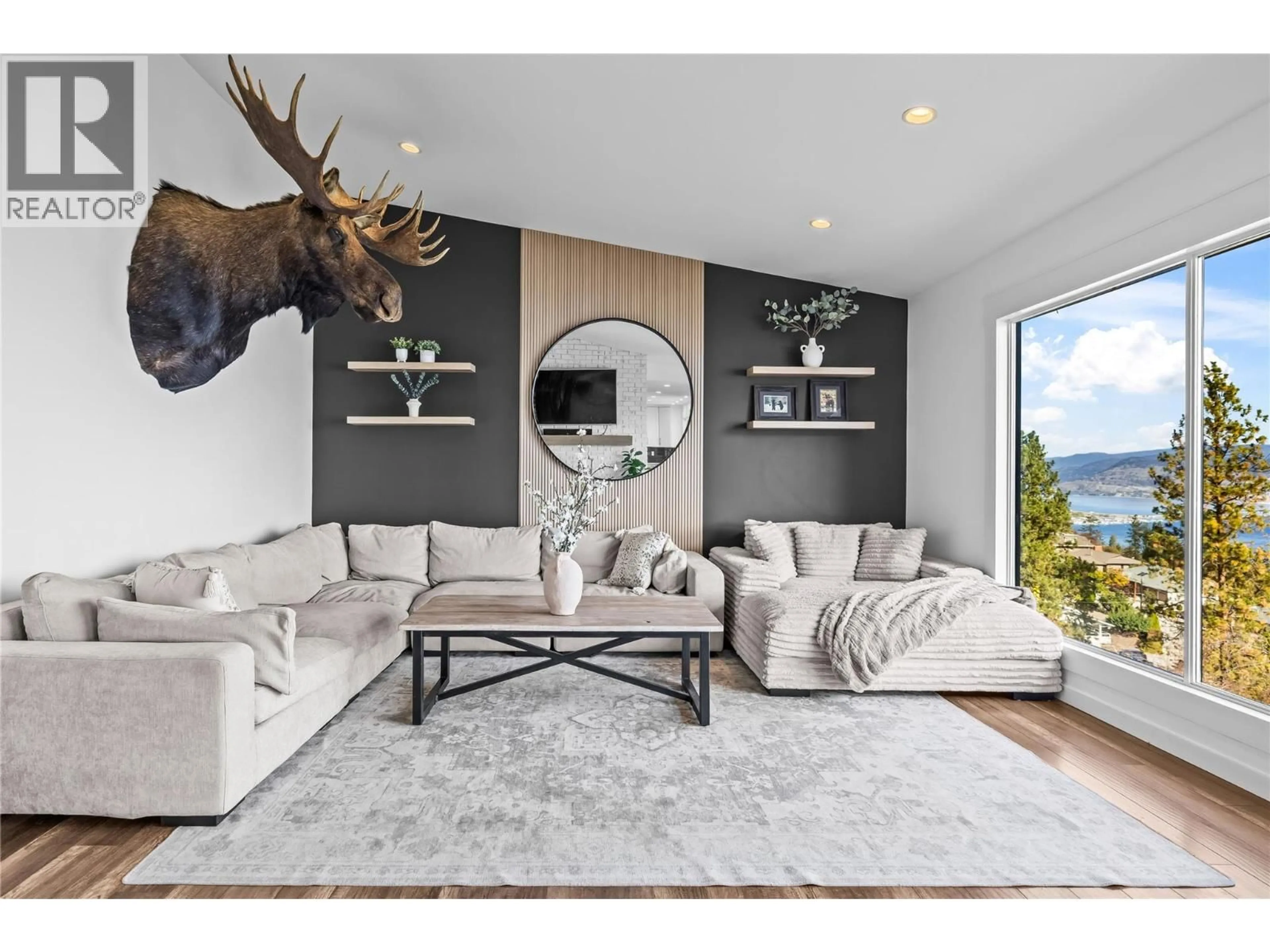 Living room with furniture, wood/laminate floor for 2751 LAKEVIEW ROAD, West Kelowna British Columbia V1Z1Y5