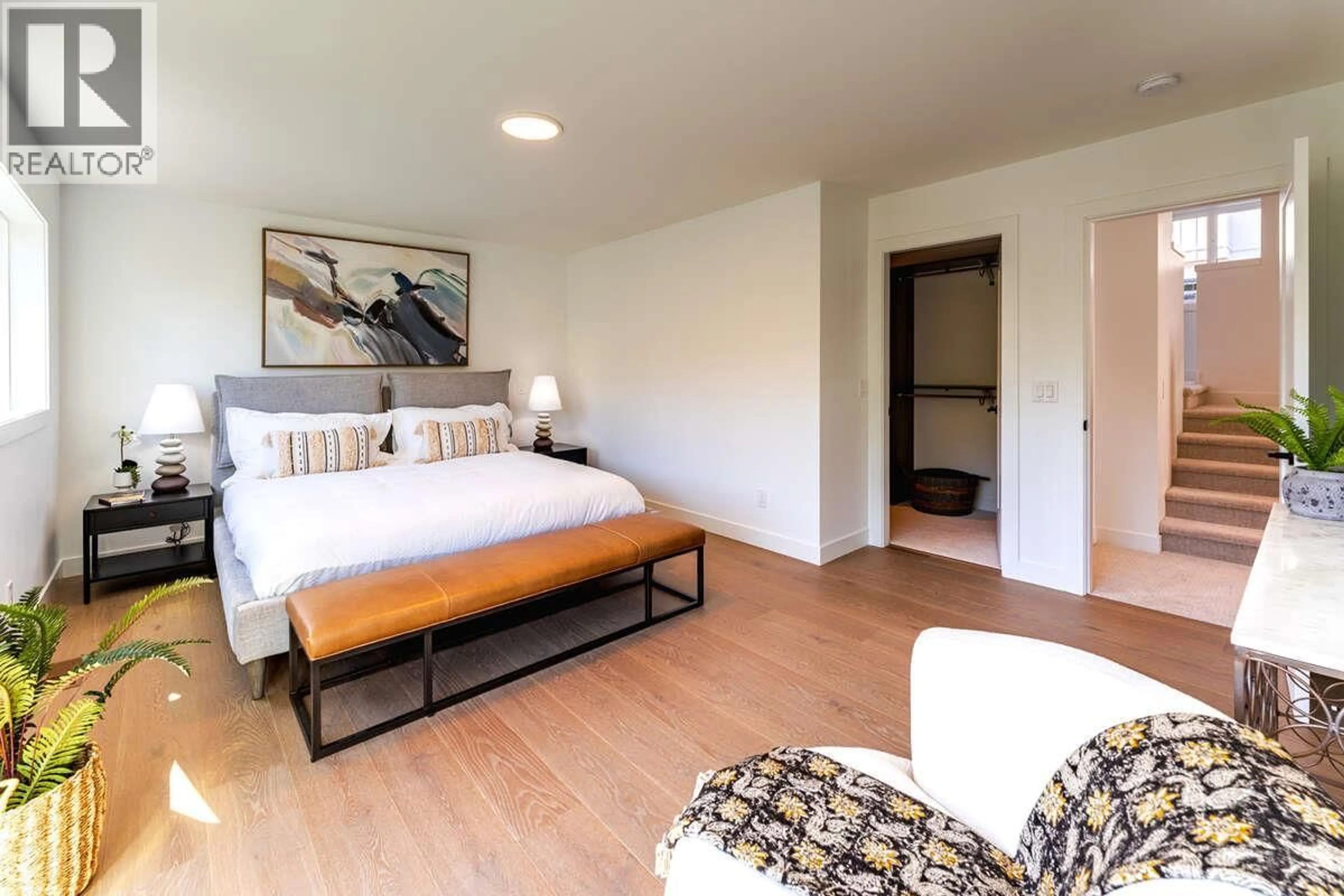 Bedroom with bed, wood/laminate floor for 56 - 1550 UNION ROAD, Kelowna British Columbia V1V0G9
