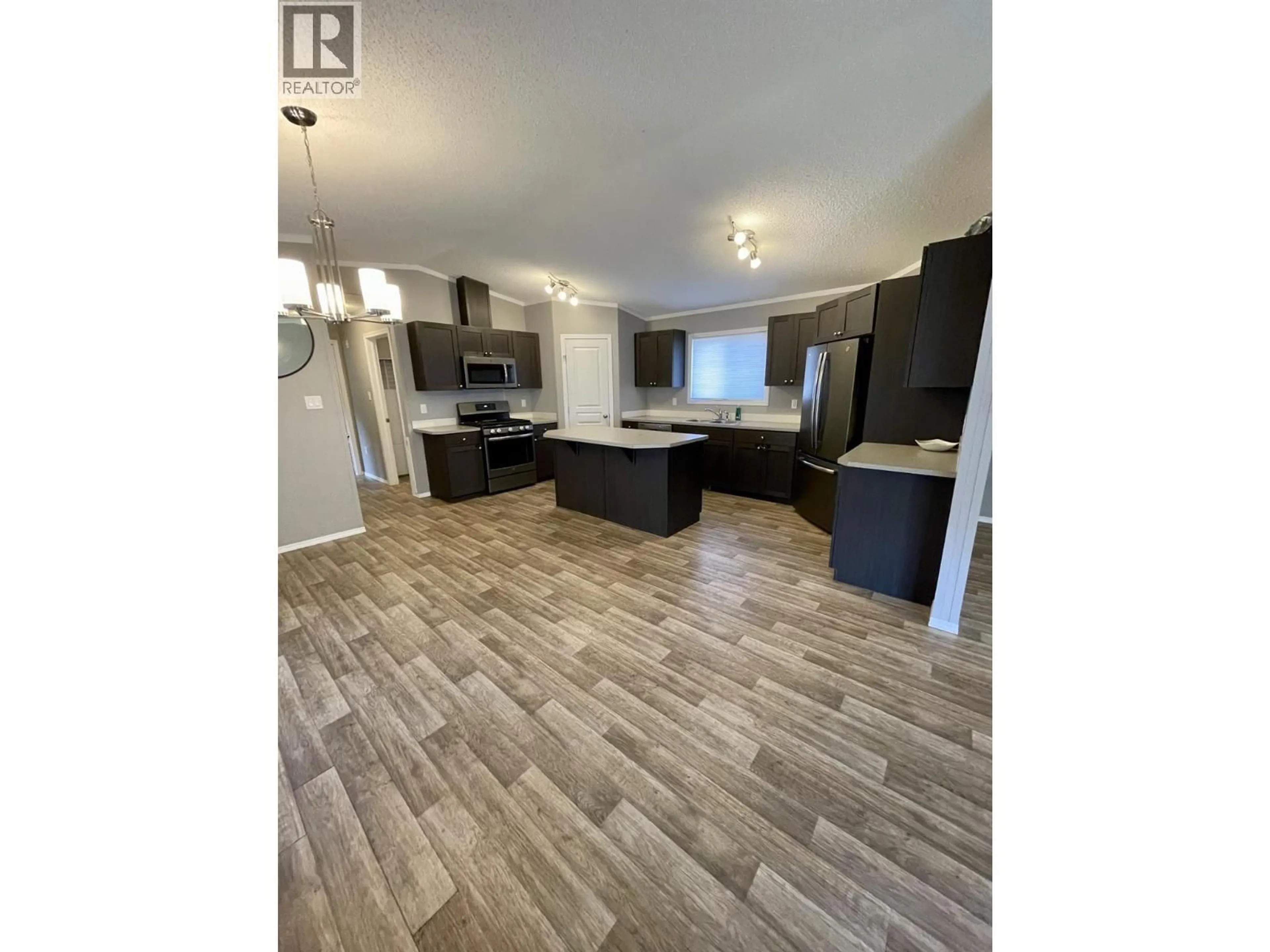 Open concept kitchen, unknown for 116 - 100 ASPEN DRIVE, Sparwood British Columbia V0B2G0