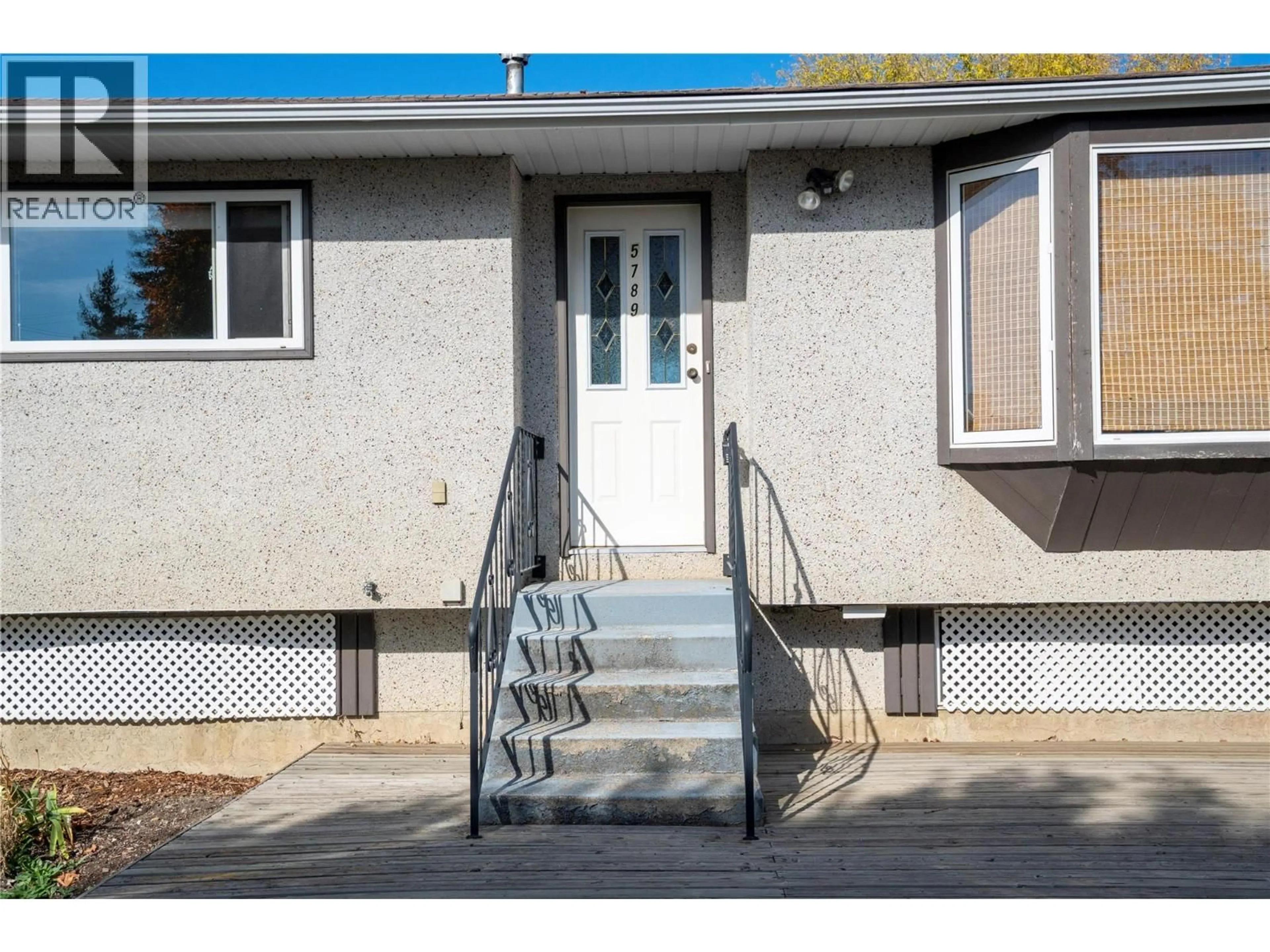 Home with vinyl exterior material, street for 5789 RIMER ROAD, Vernon British Columbia V1B3L3