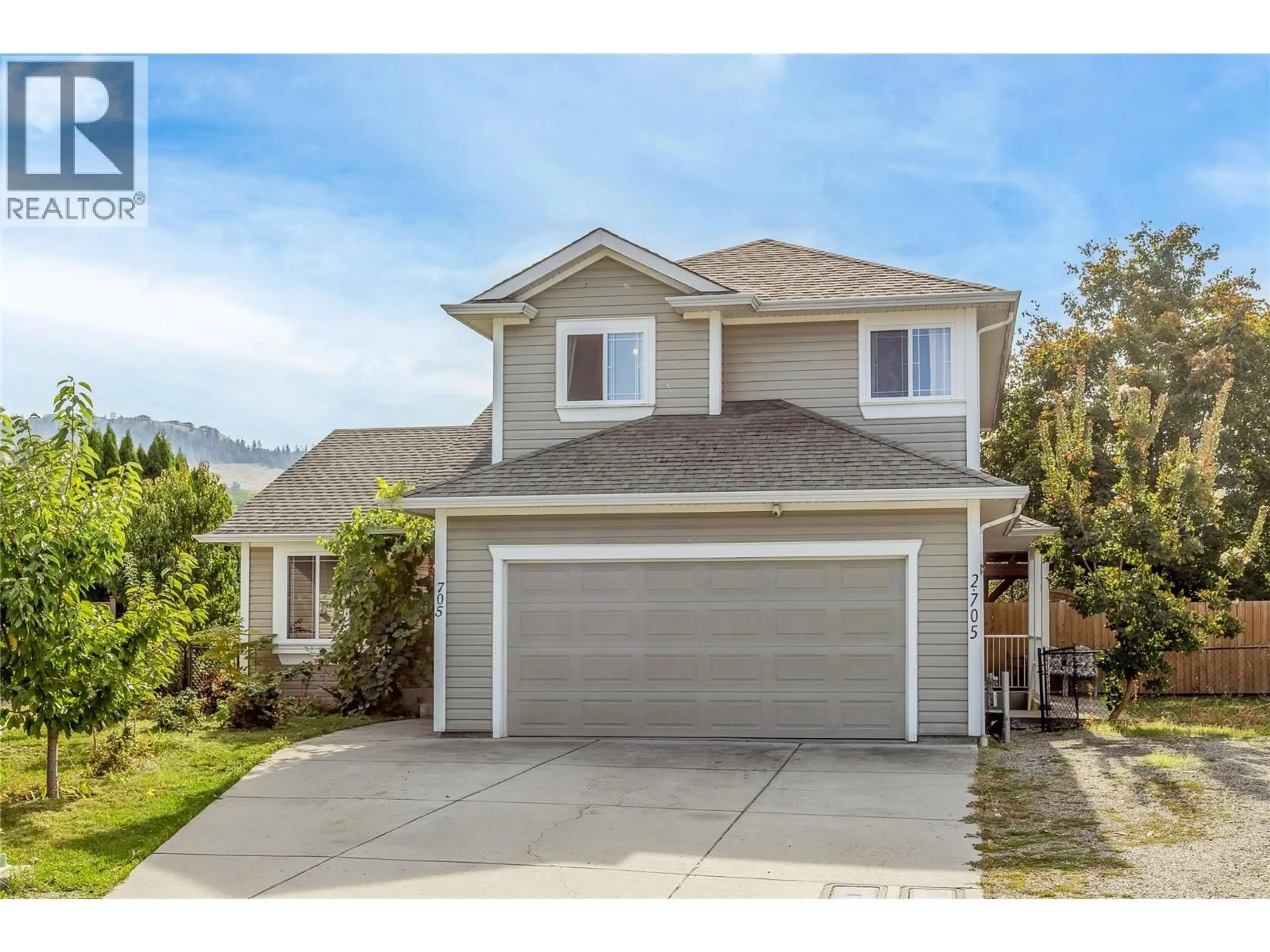 Home with vinyl exterior material, street for 705 STOLTZ COURT, Kelowna British Columbia V1X7X7