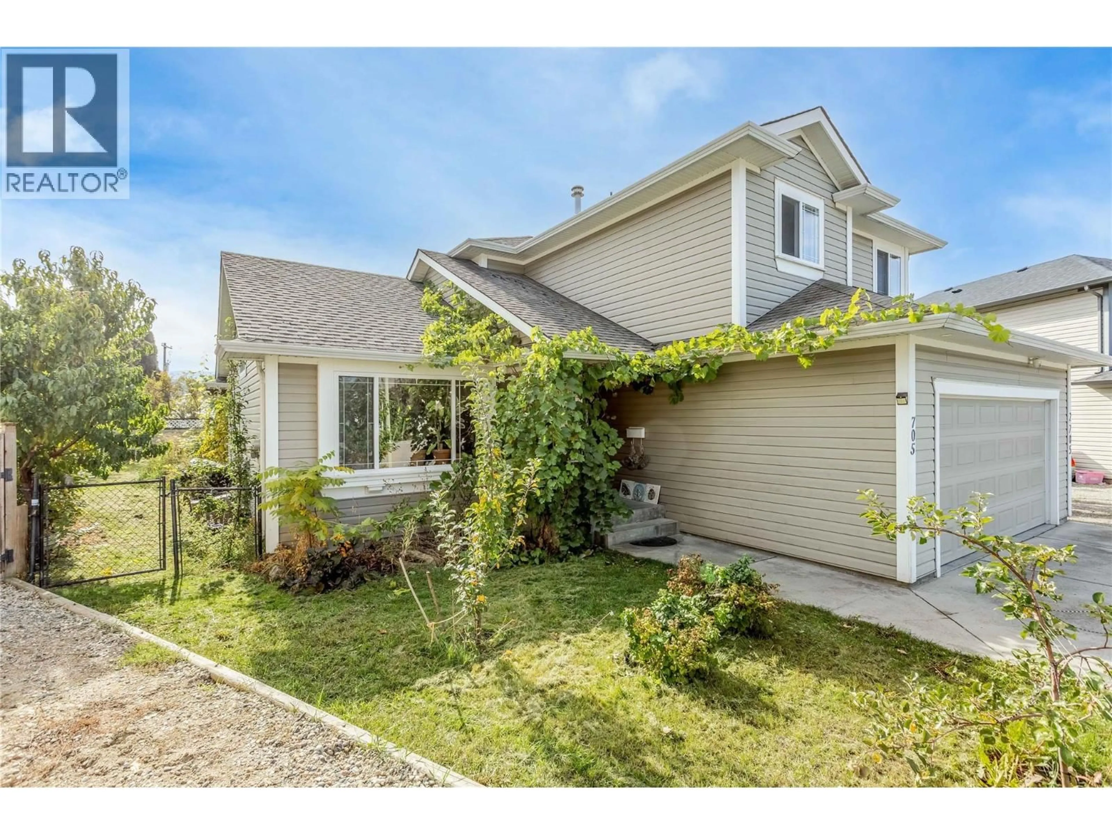 Home with vinyl exterior material, street for 705 STOLTZ COURT, Kelowna British Columbia V1X7X7