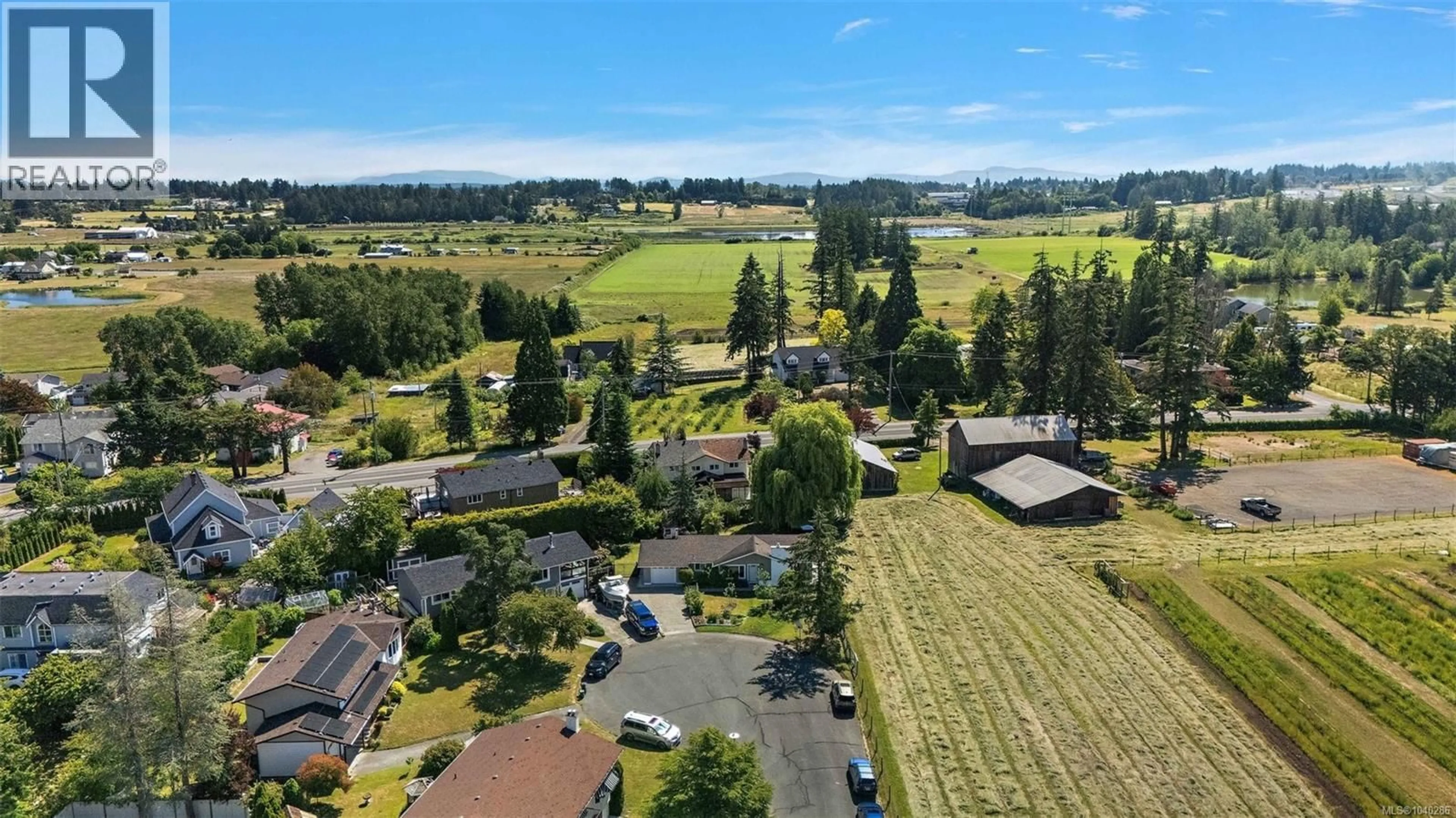 A pic from outside/outdoor area/front of a property/back of a property/a pic from drone, mountain view for 1372 RAFIKI PLACE, Central Saanich British Columbia V8M1G5
