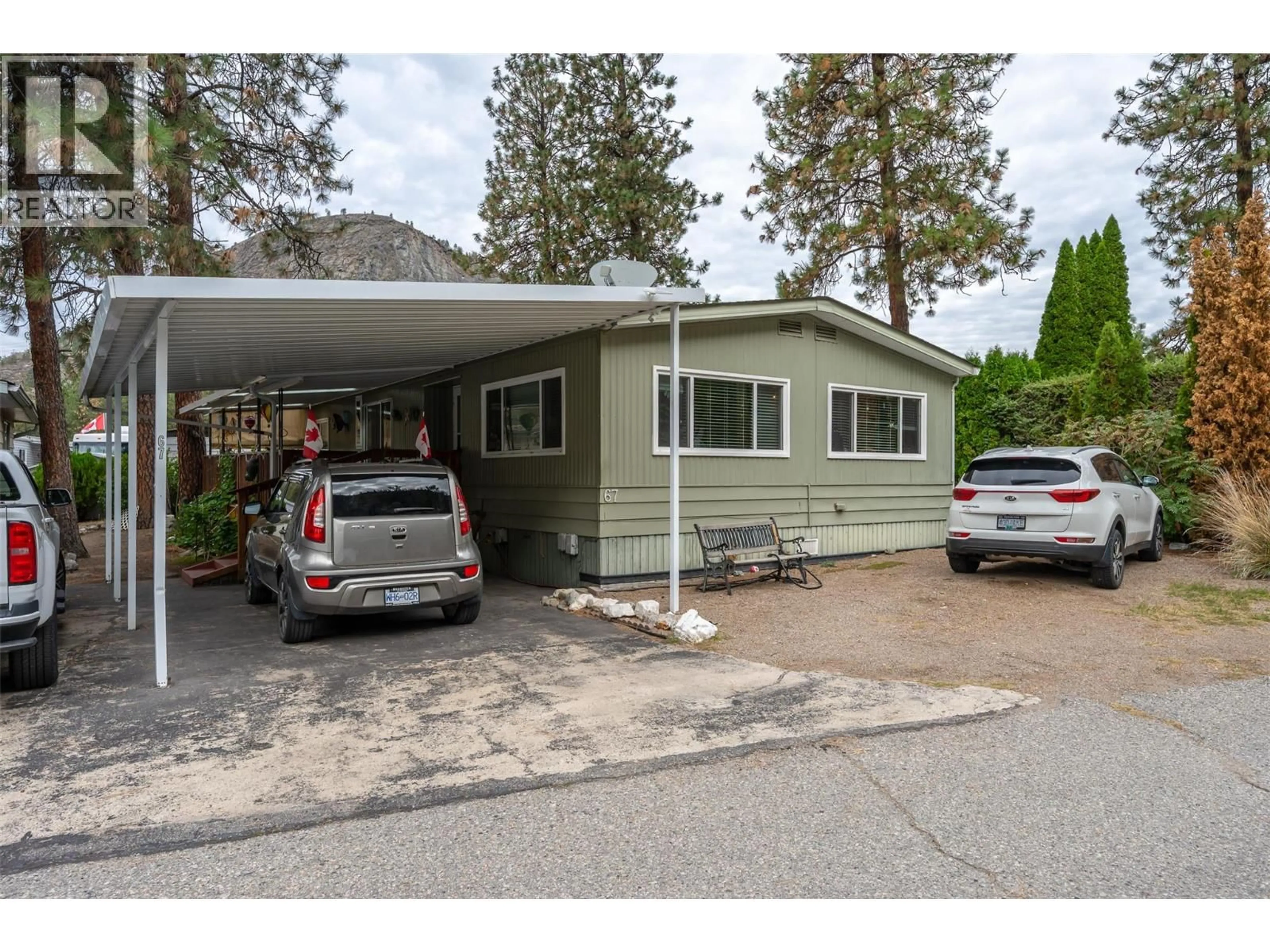 Home with vinyl exterior material, street for 67 - 8487 HIGHWAY 97 HIGHWAY, Oliver British Columbia V0H1T2