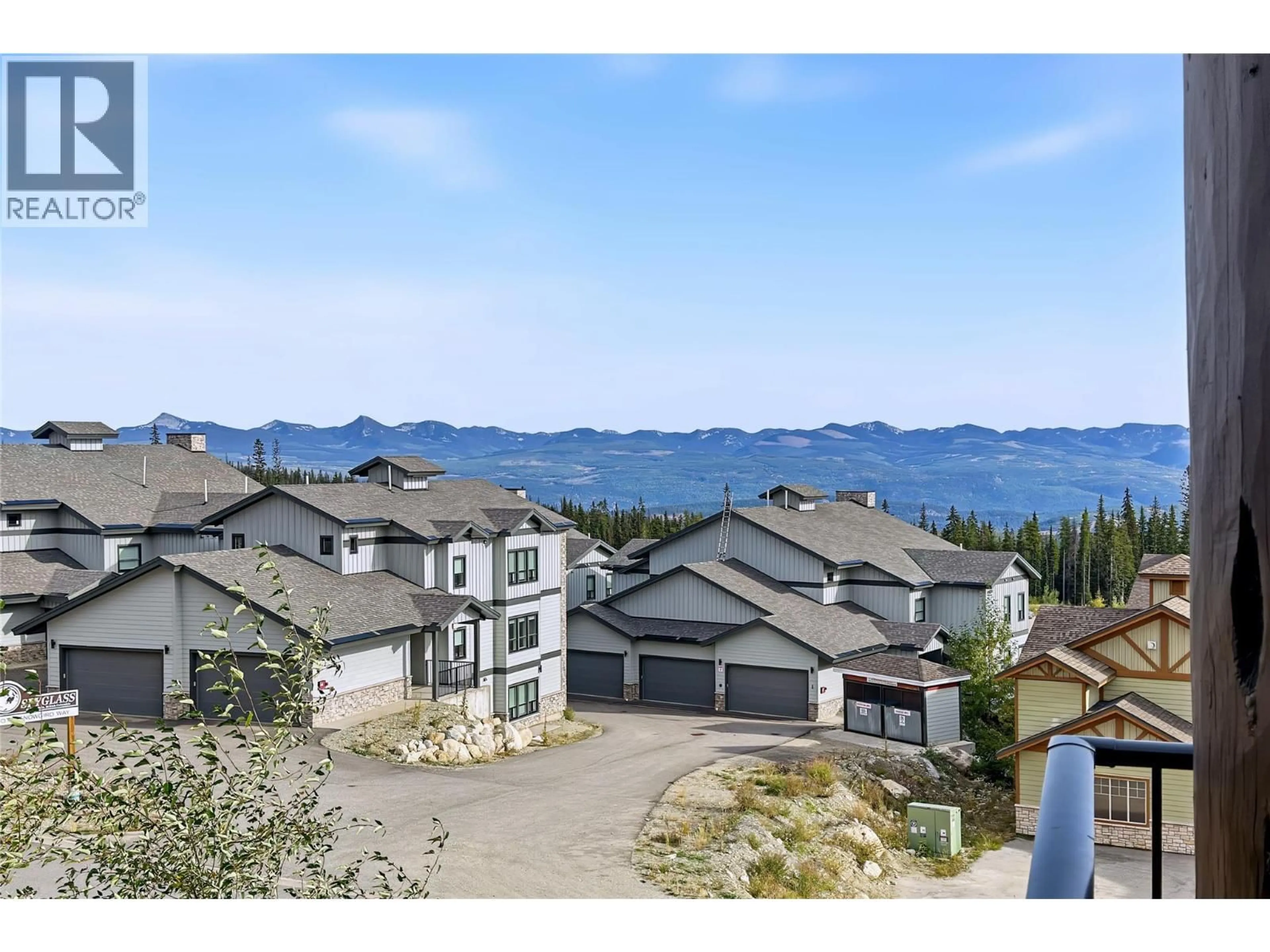 A pic from outside/outdoor area/front of a property/back of a property/a pic from drone, mountain view for 406 - 5030 SNOWBIRD WAY, Big White British Columbia V1P1P3