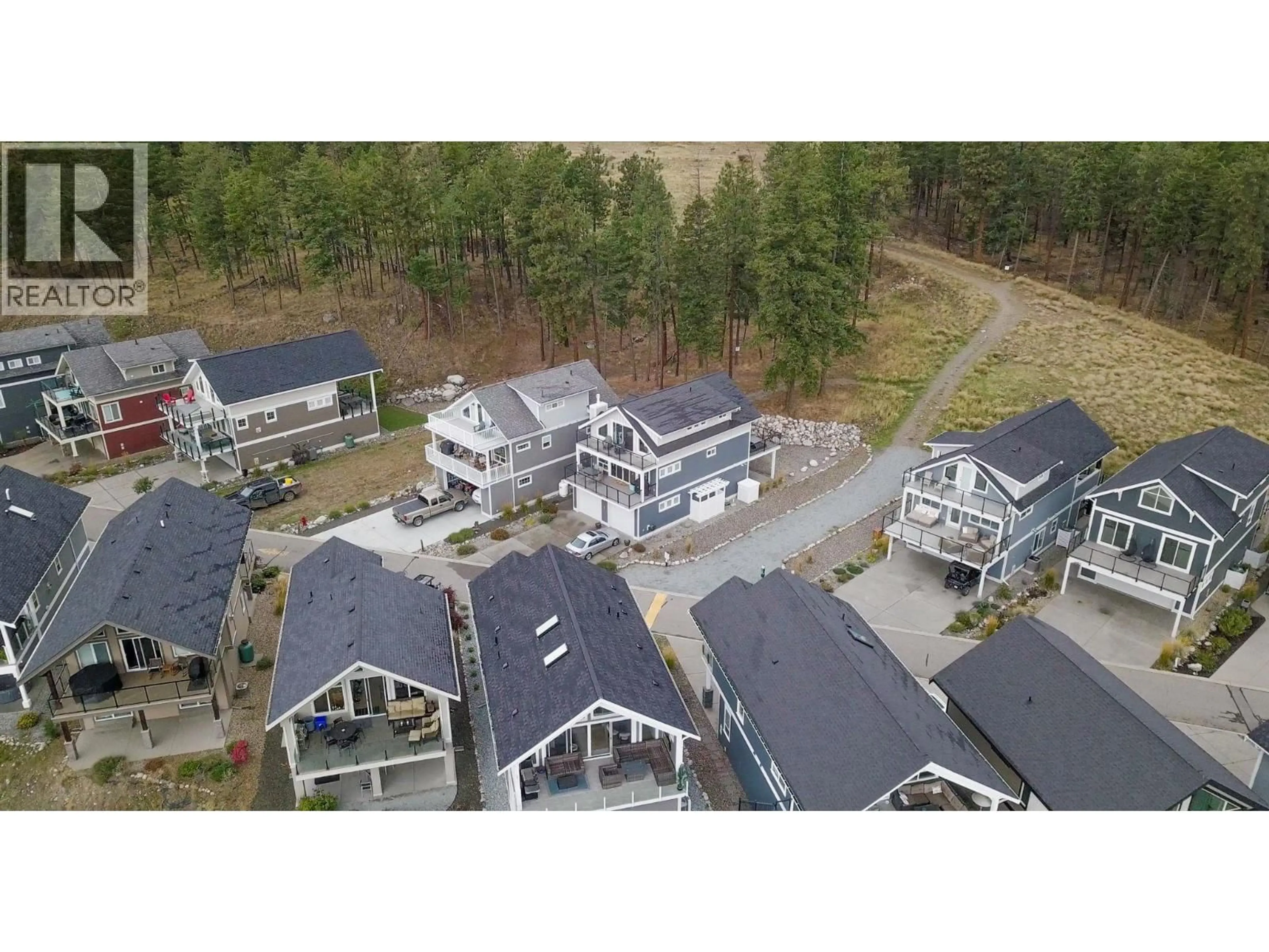 A pic from outside/outdoor area/front of a property/back of a property/a pic from drone, unknown for 6976 TERAZONA DRIVE, Kelowna British Columbia V1Z3R8