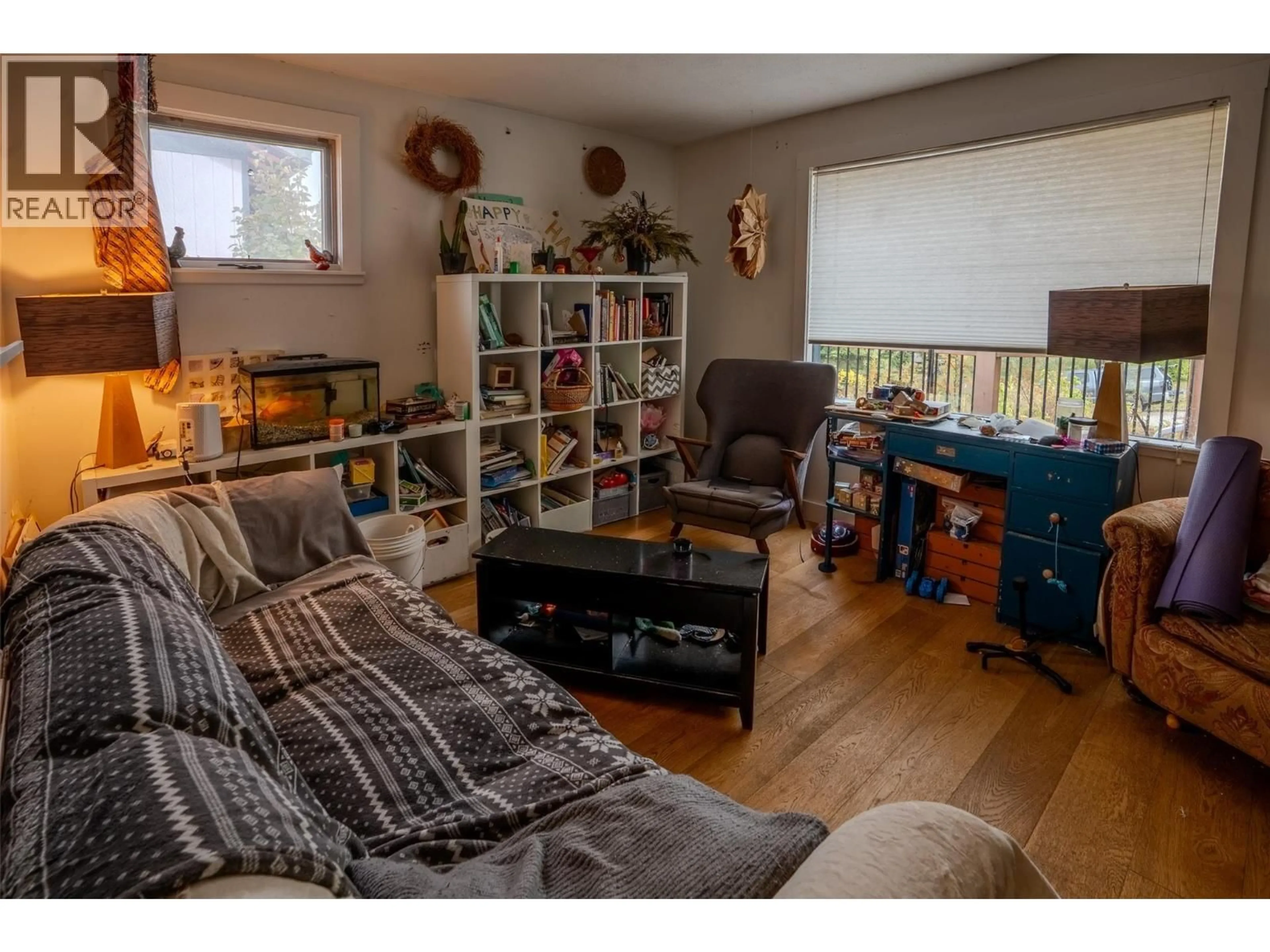 Living room with furniture, wood/laminate floor for 1424 FALLS STREET, Nelson British Columbia V1L1J4