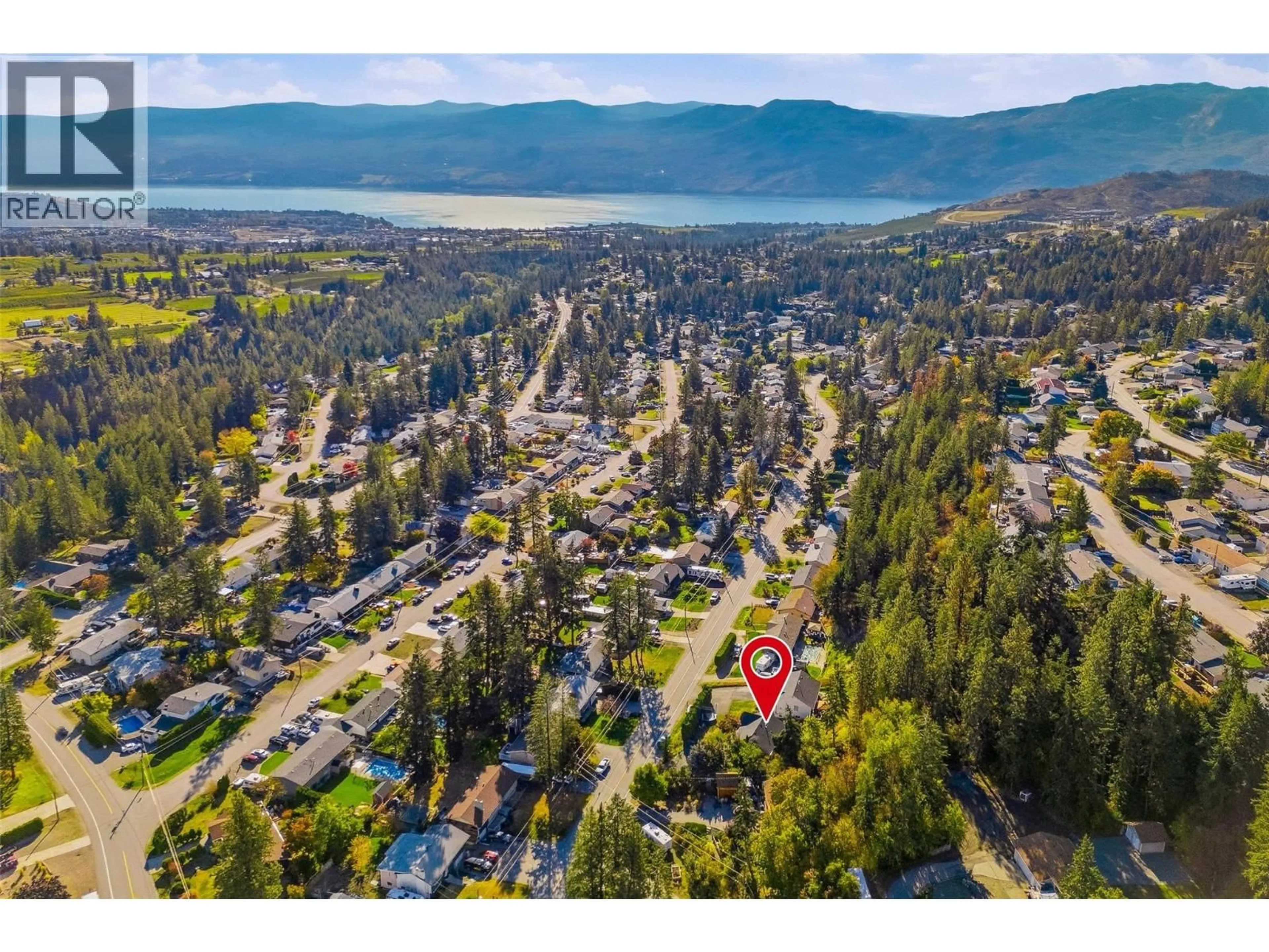 A pic from outside/outdoor area/front of a property/back of a property/a pic from drone, unknown for 3220 MCIVER ROAD, West Kelowna British Columbia V4T1G1