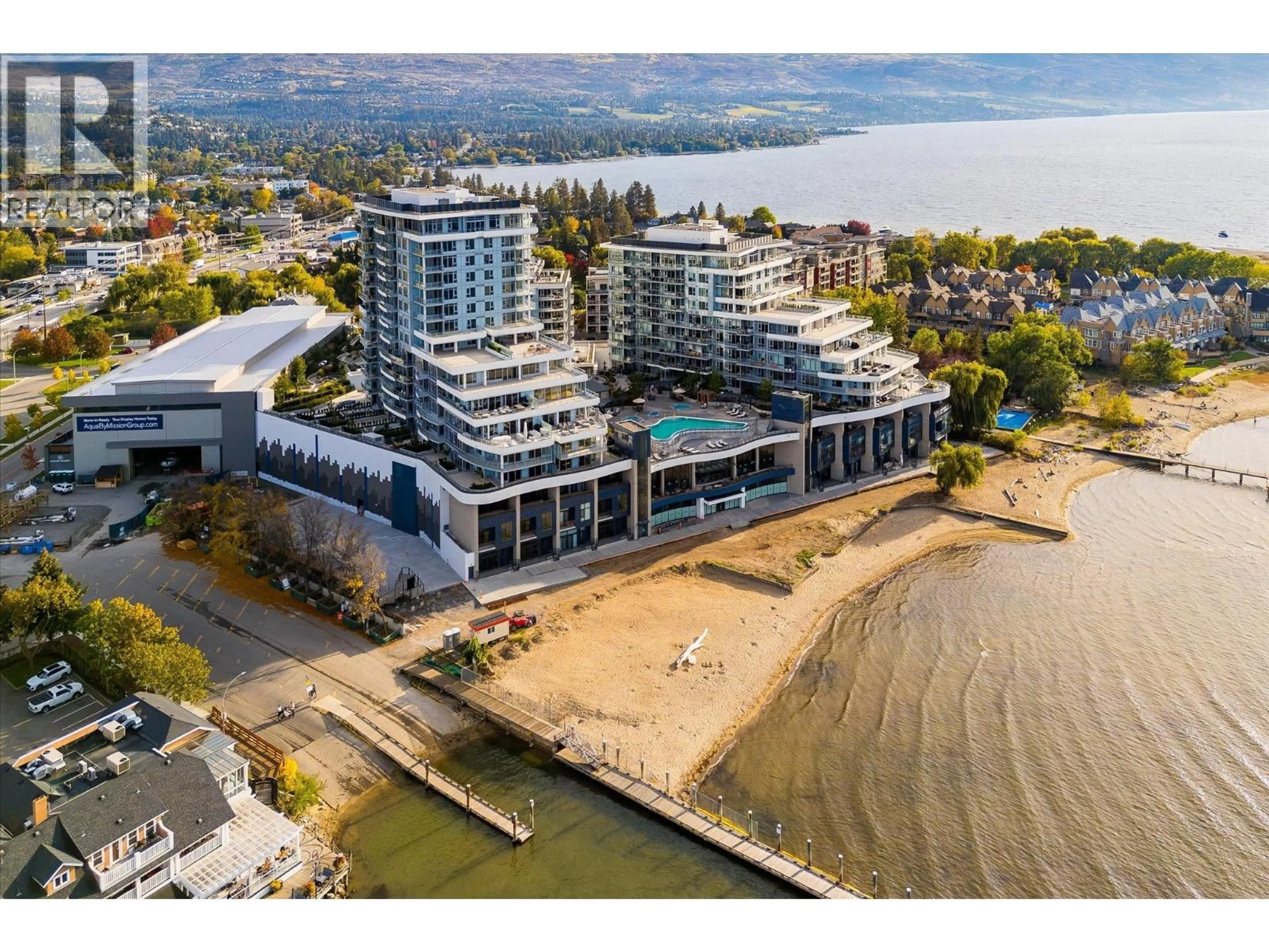 A pic from outside/outdoor area/front of a property/back of a property/a pic from drone, water/lake/river/ocean view for 407 - 3699 CAPOZZI ROAD, Kelowna British Columbia V1W3L2