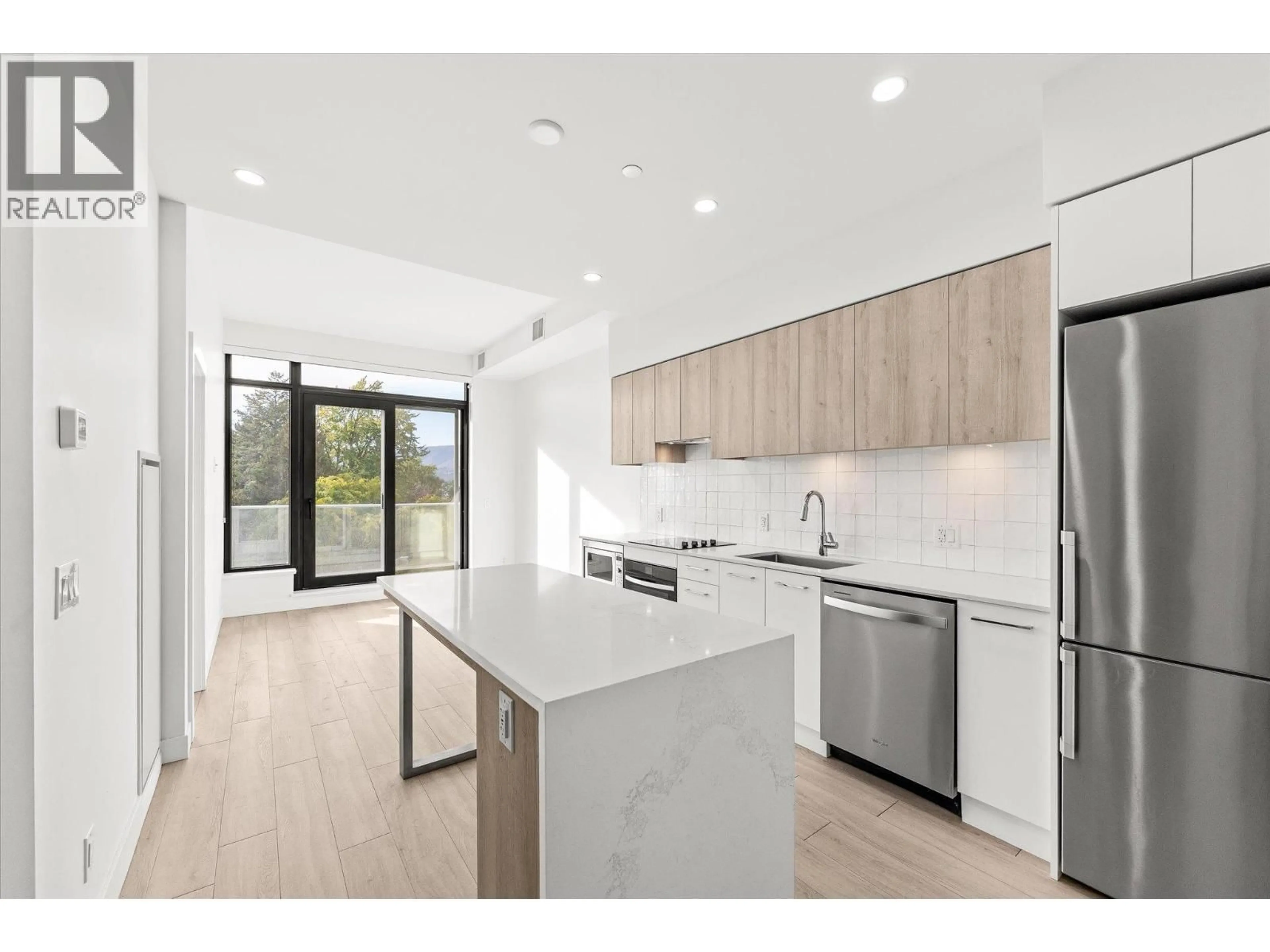 Open concept kitchen, unknown for 407 - 3699 CAPOZZI ROAD, Kelowna British Columbia V1W3L2