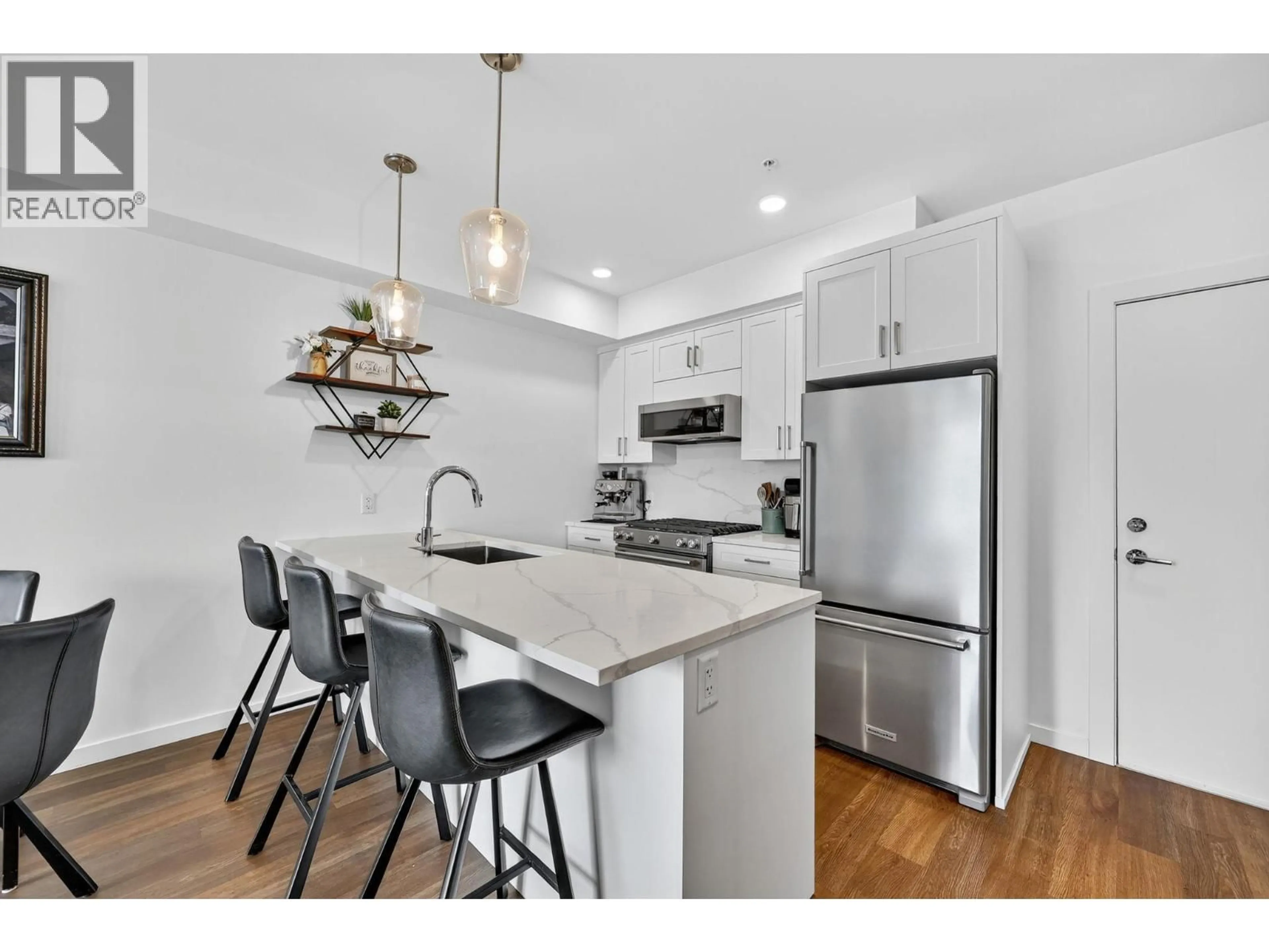Open concept kitchen, unknown for 303 - 2627 GORE STREET, Kelowna British Columbia V1Y1M6