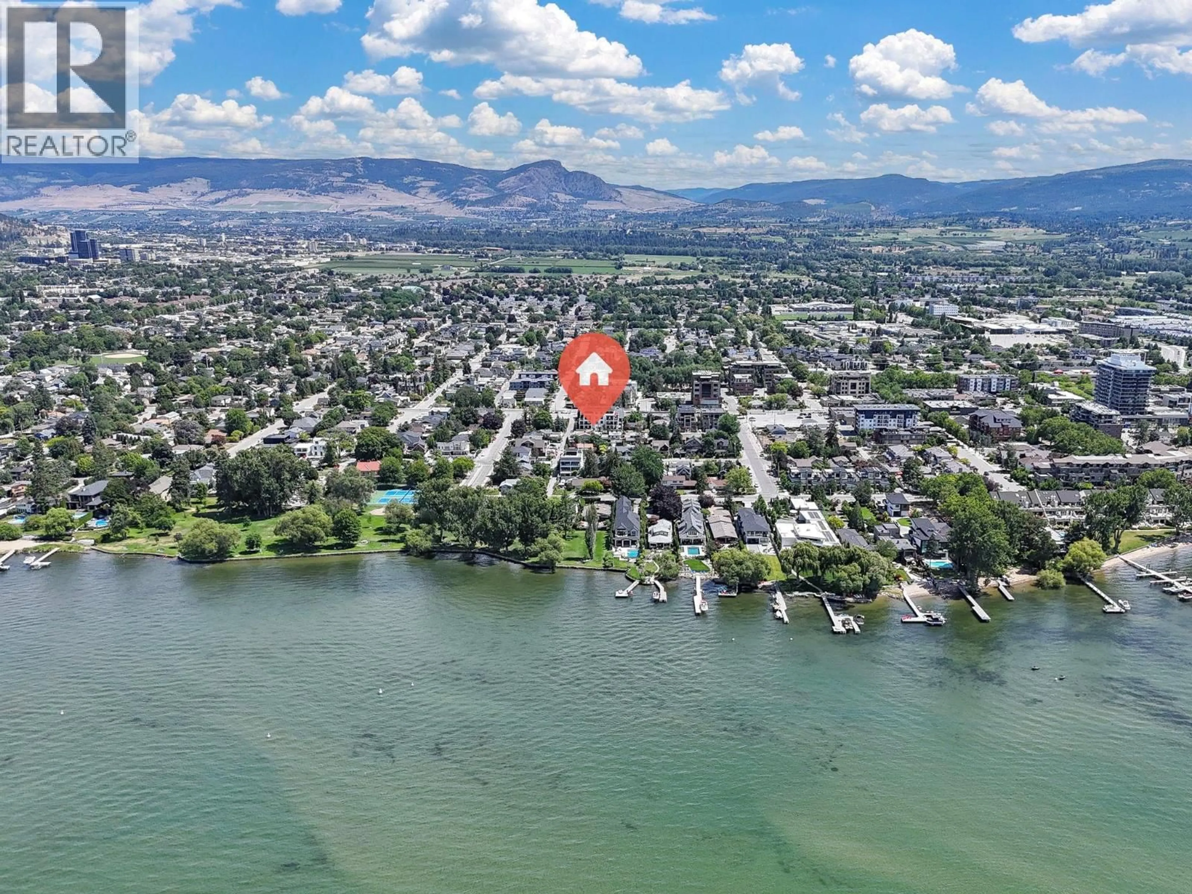 A pic from outside/outdoor area/front of a property/back of a property/a pic from drone, water/lake/river/ocean view for 303 - 2627 GORE STREET, Kelowna British Columbia V1Y1M6