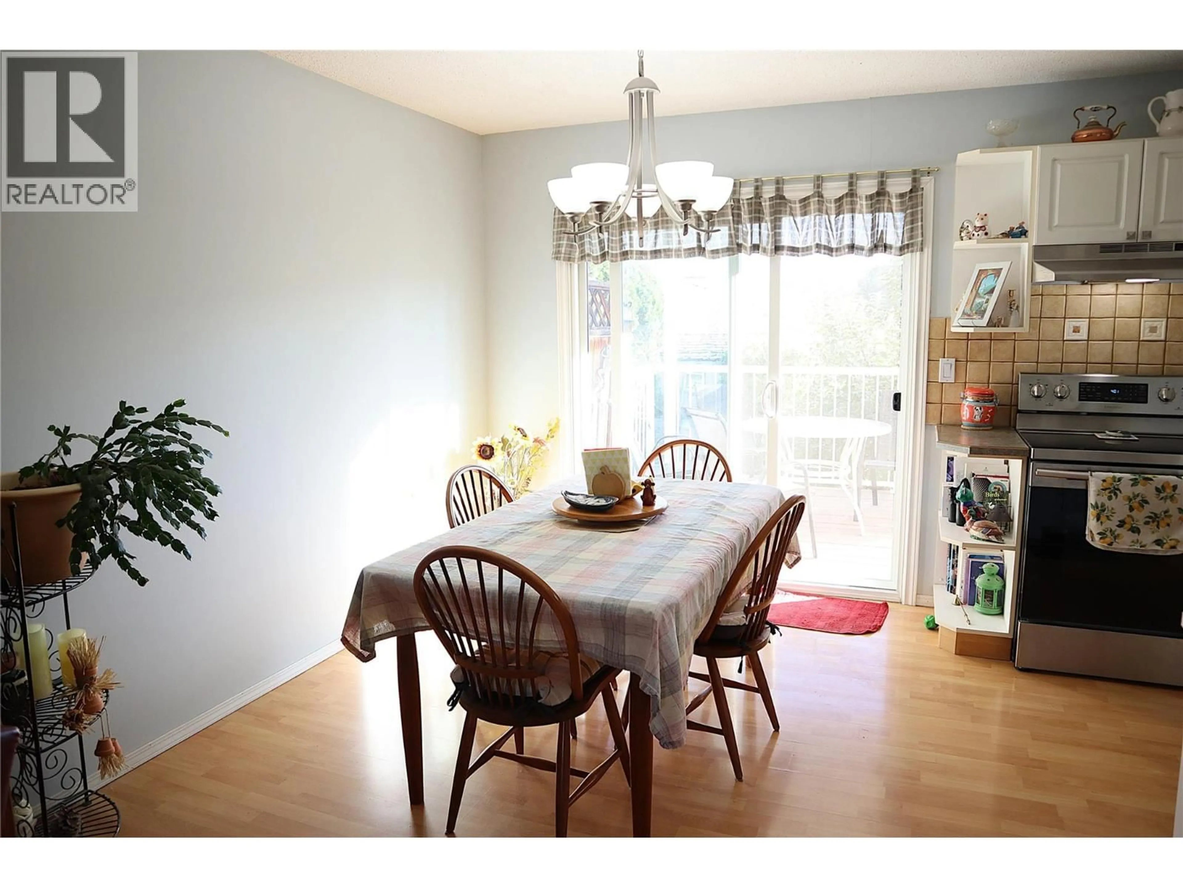 Dining room, wood/laminate floor for 1233 HOOK DRIVE, Kamloops British Columbia V2B7S8