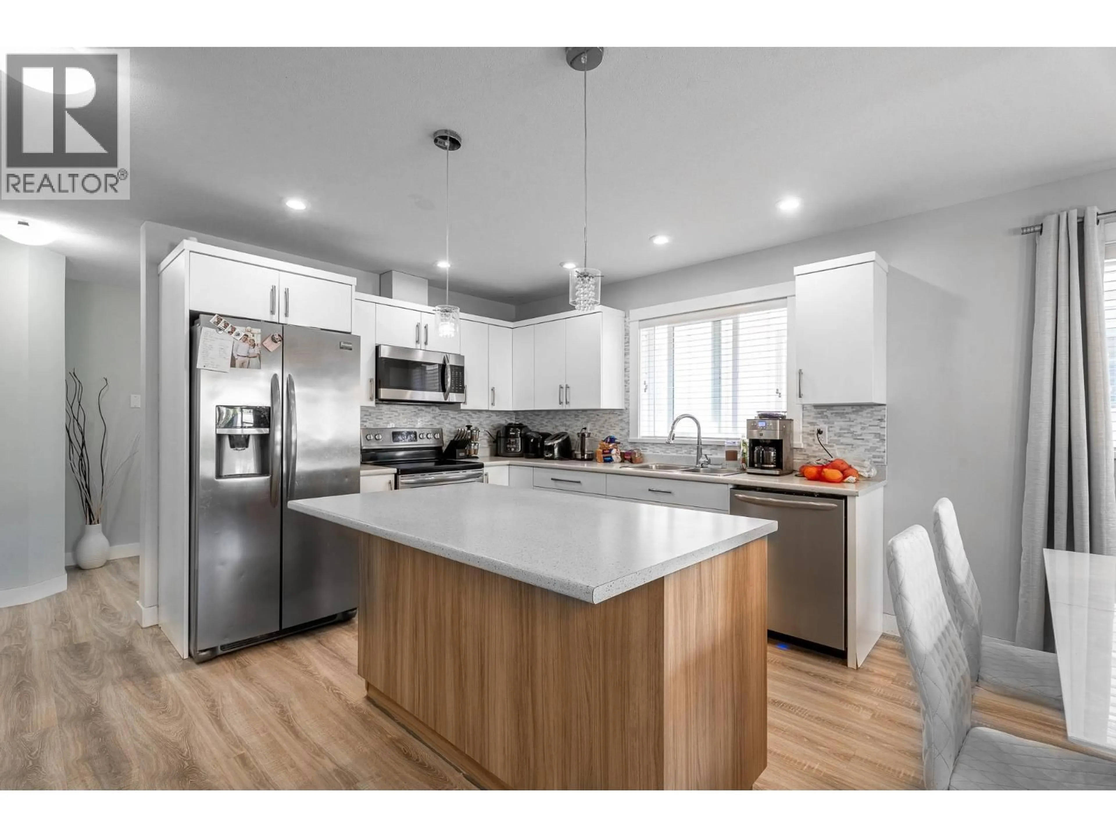 Open concept kitchen, wood/laminate floor for 135 - 8800 DALLAS DRIVE, Kamloops British Columbia V2C0G8