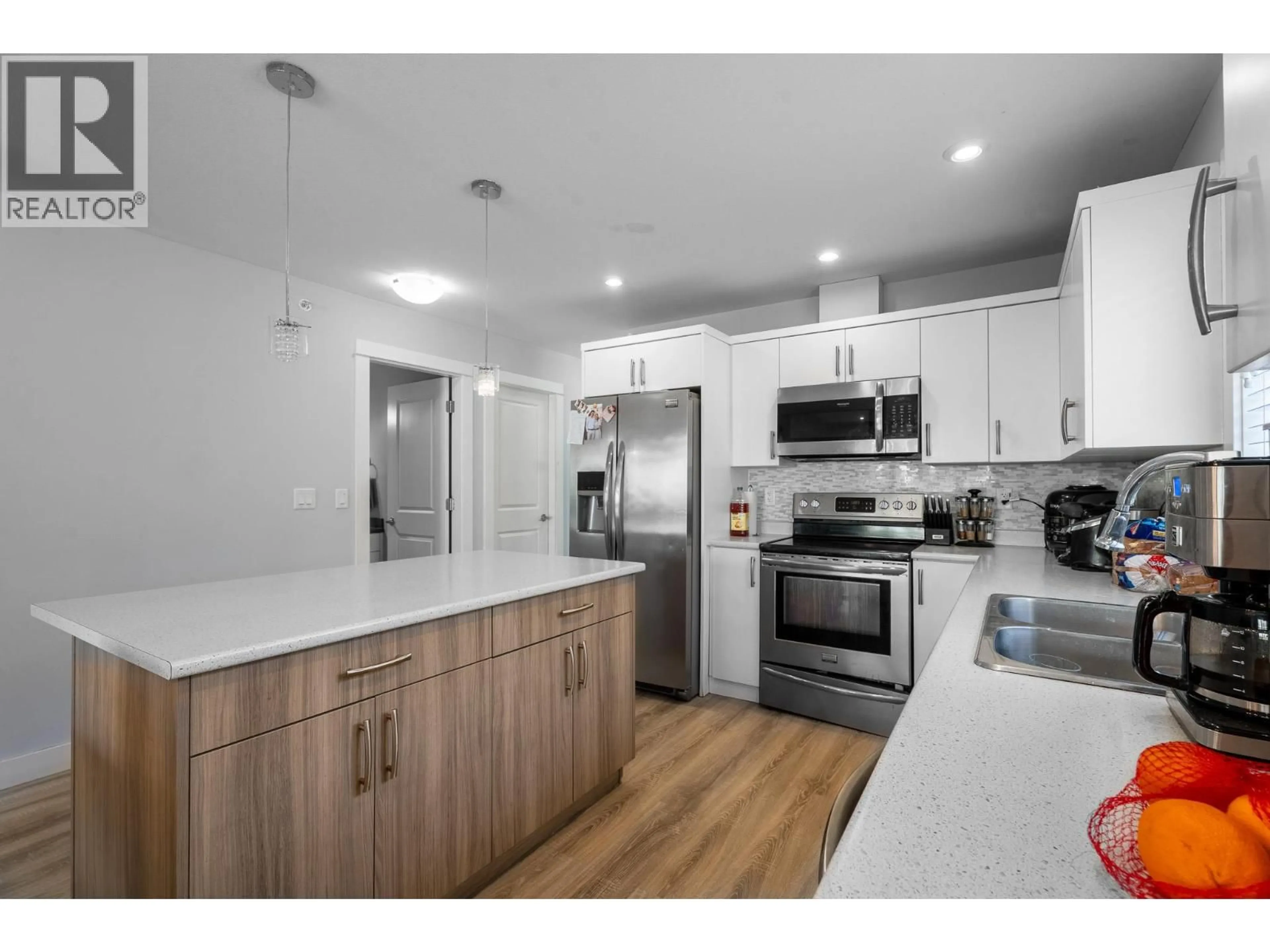 Open concept kitchen, wood/laminate floor for 135 - 8800 DALLAS DRIVE, Kamloops British Columbia V2C0G8
