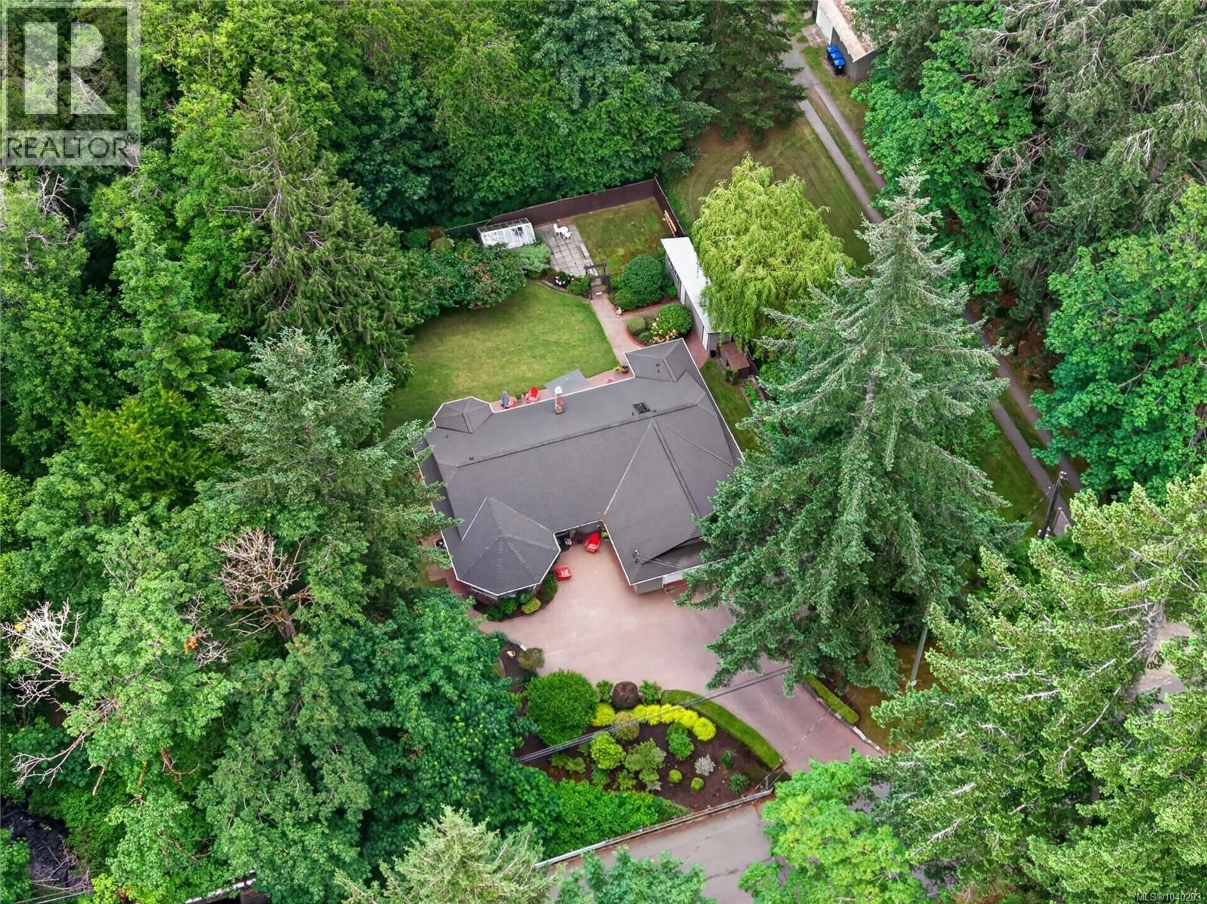 A pic from outside/outdoor area/front of a property/back of a property/a pic from drone, forest/trees view for 408 POWERHOUSE ROAD, Courtenay British Columbia V9N9L1