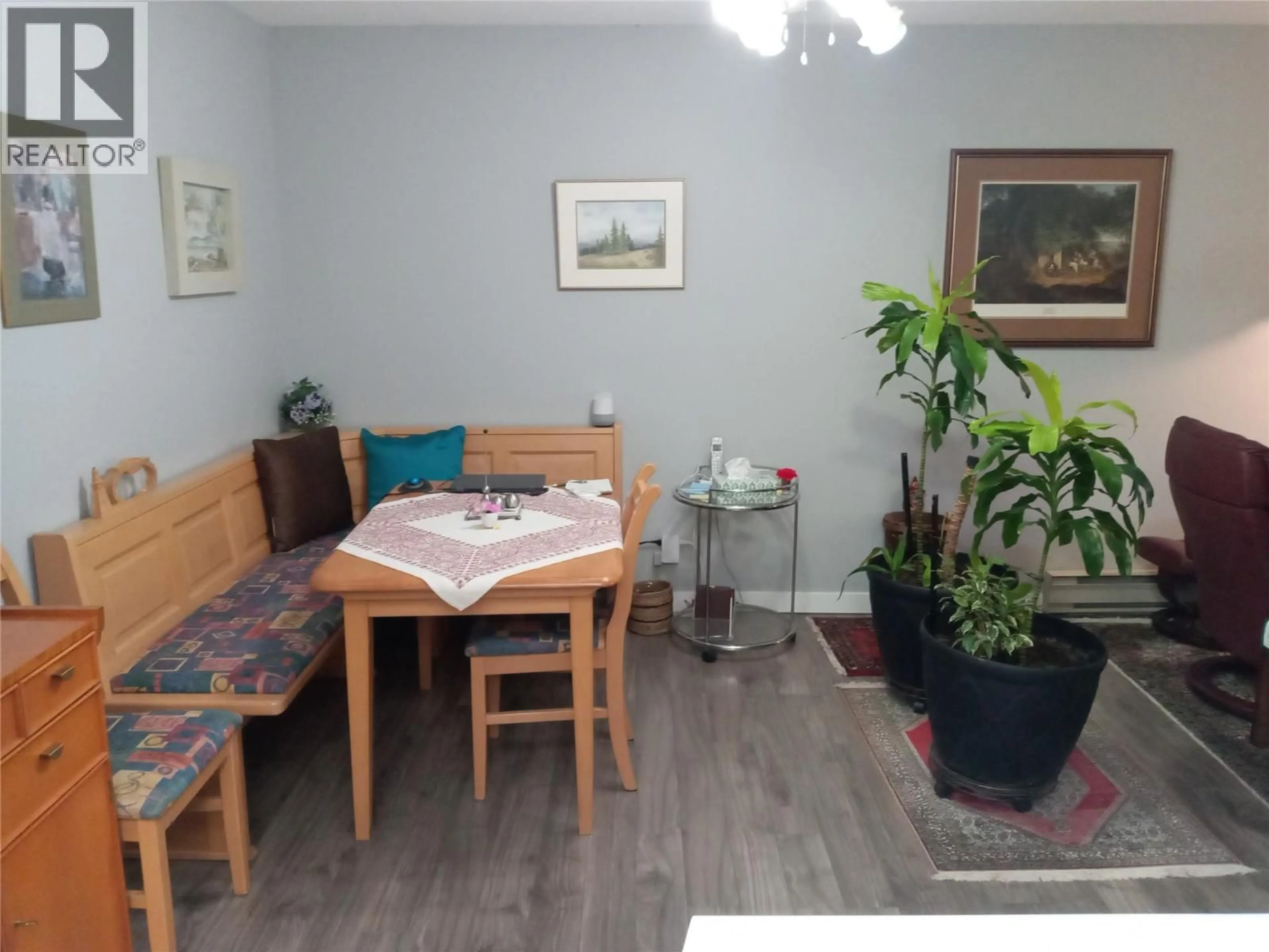 Dining room, wood/laminate floor for 401 - 272 GREEN AVENUE, Penticton British Columbia V2A3T2