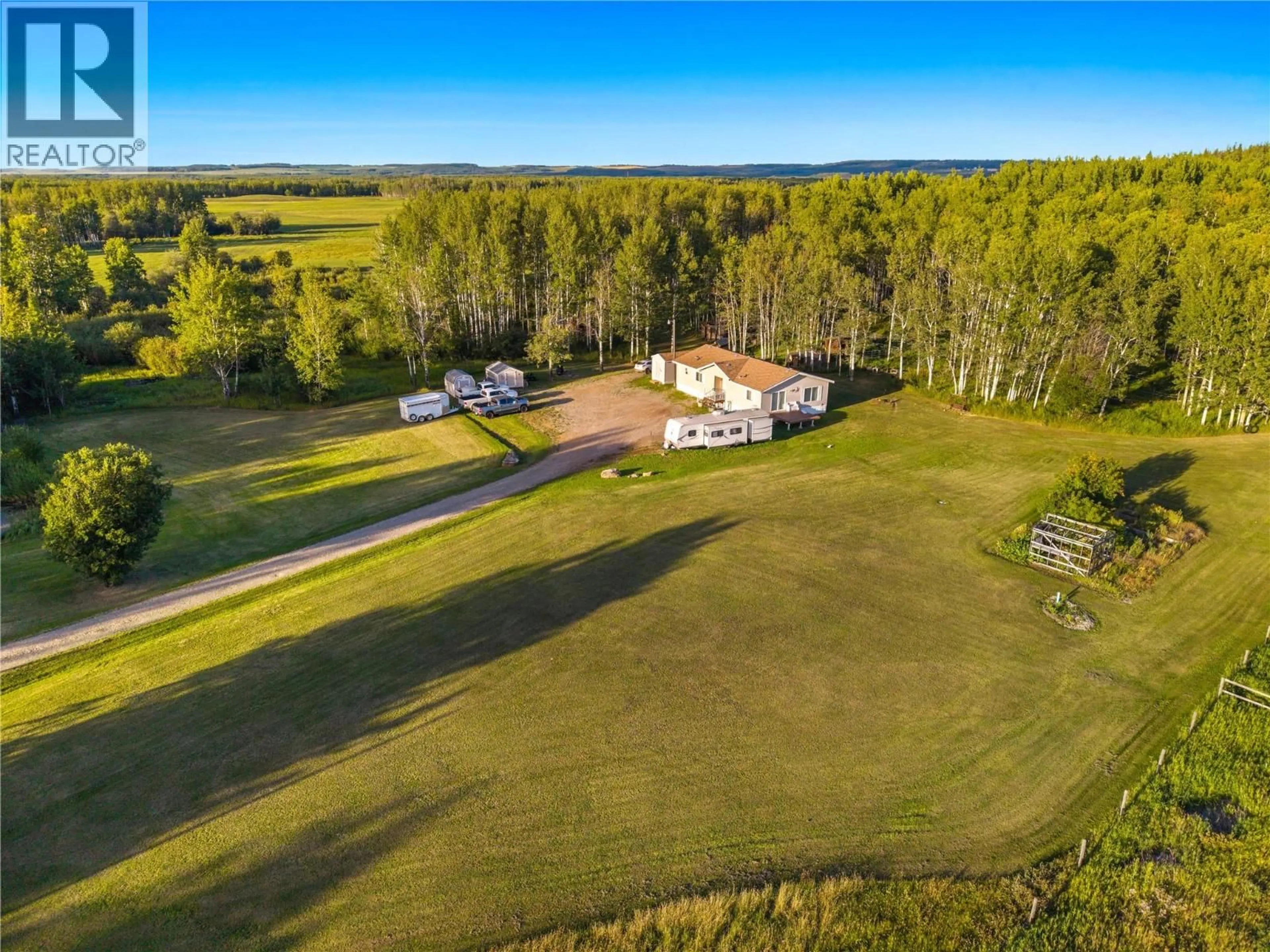 A pic from outside/outdoor area/front of a property/back of a property/a pic from drone, unknown for 9666 251 ROAD, Dawson Creek British Columbia V1G0J2