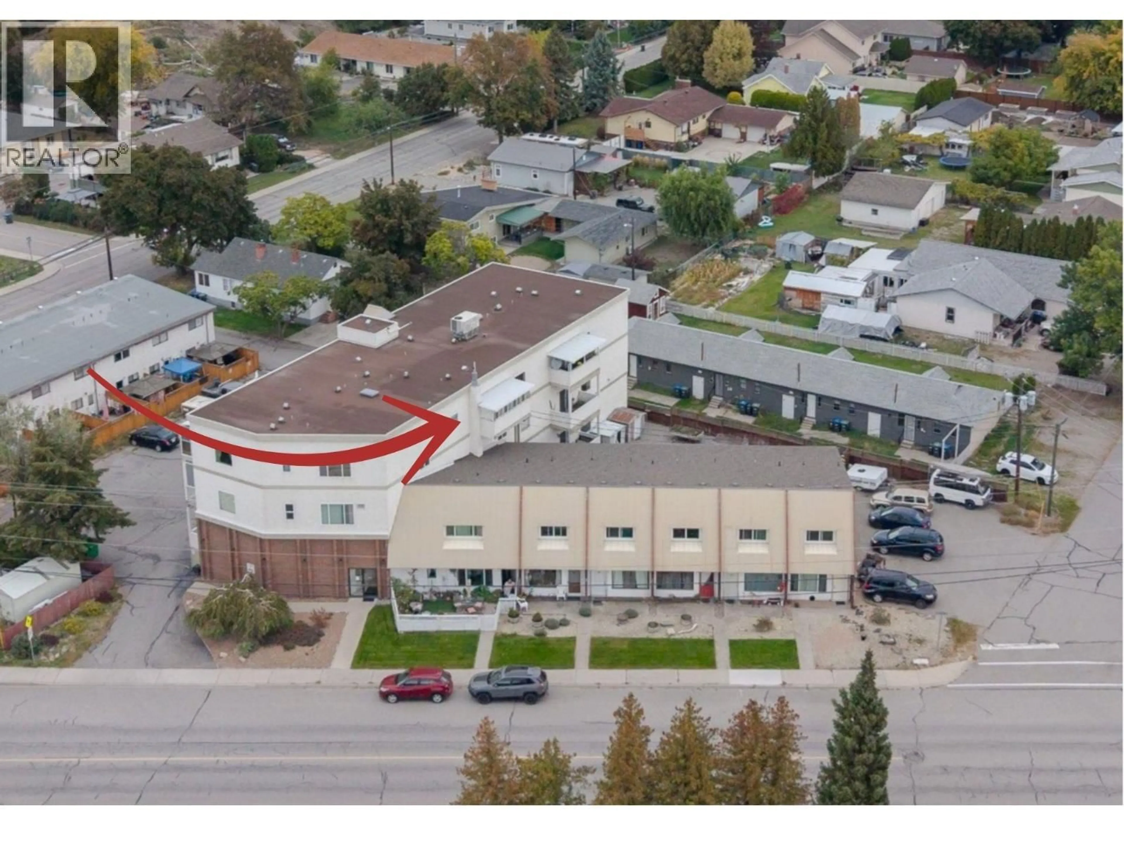 A pic from outside/outdoor area/front of a property/back of a property/a pic from drone, building for 325 - 650 MCKINNEY ROAD, Oliver British Columbia V0H1T3