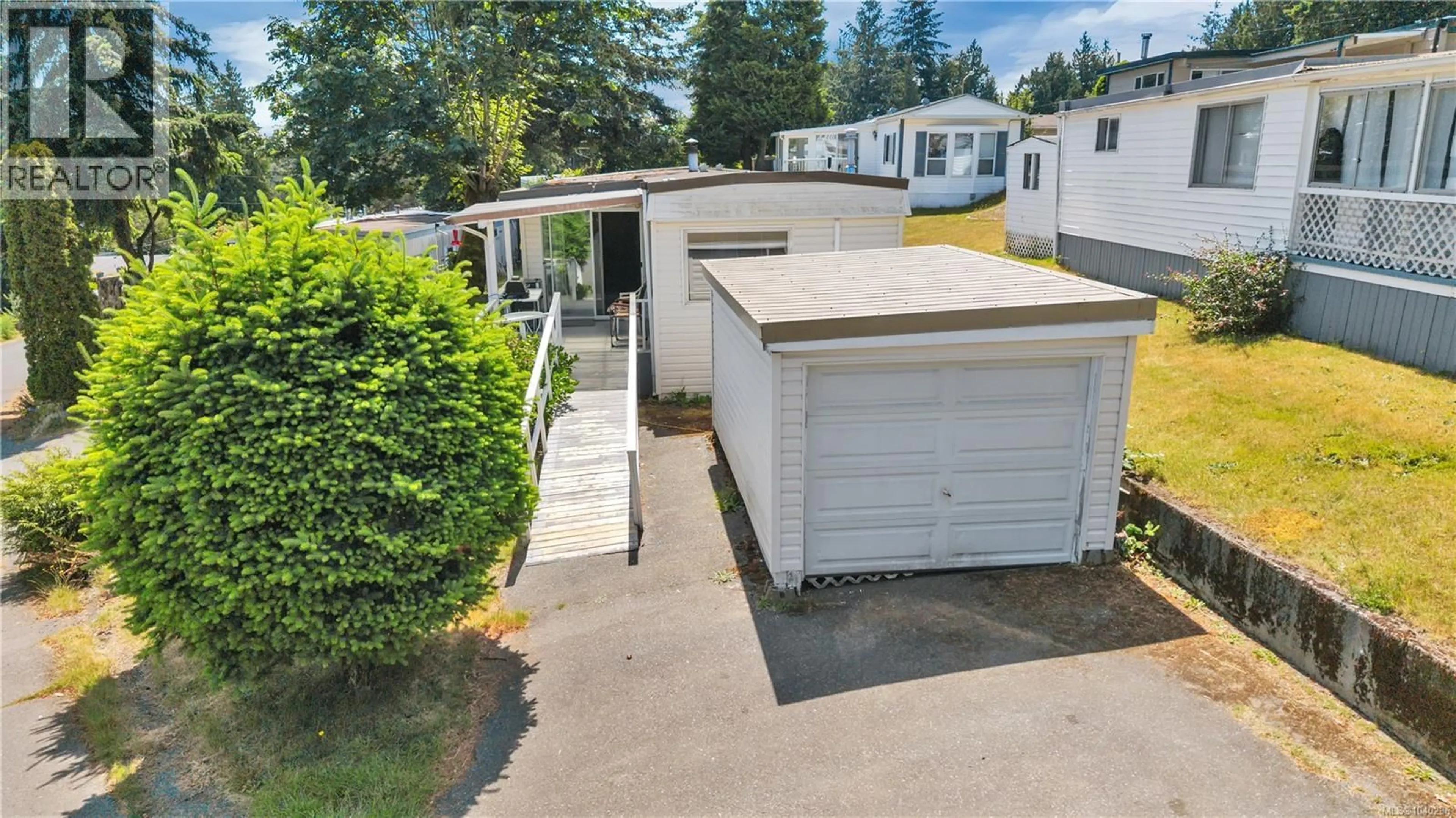 A pic from outside/outdoor area/front of a property/back of a property/a pic from drone, street for 19 - 1000 CHASE RIVER ROAD, Nanaimo British Columbia V9R6L8