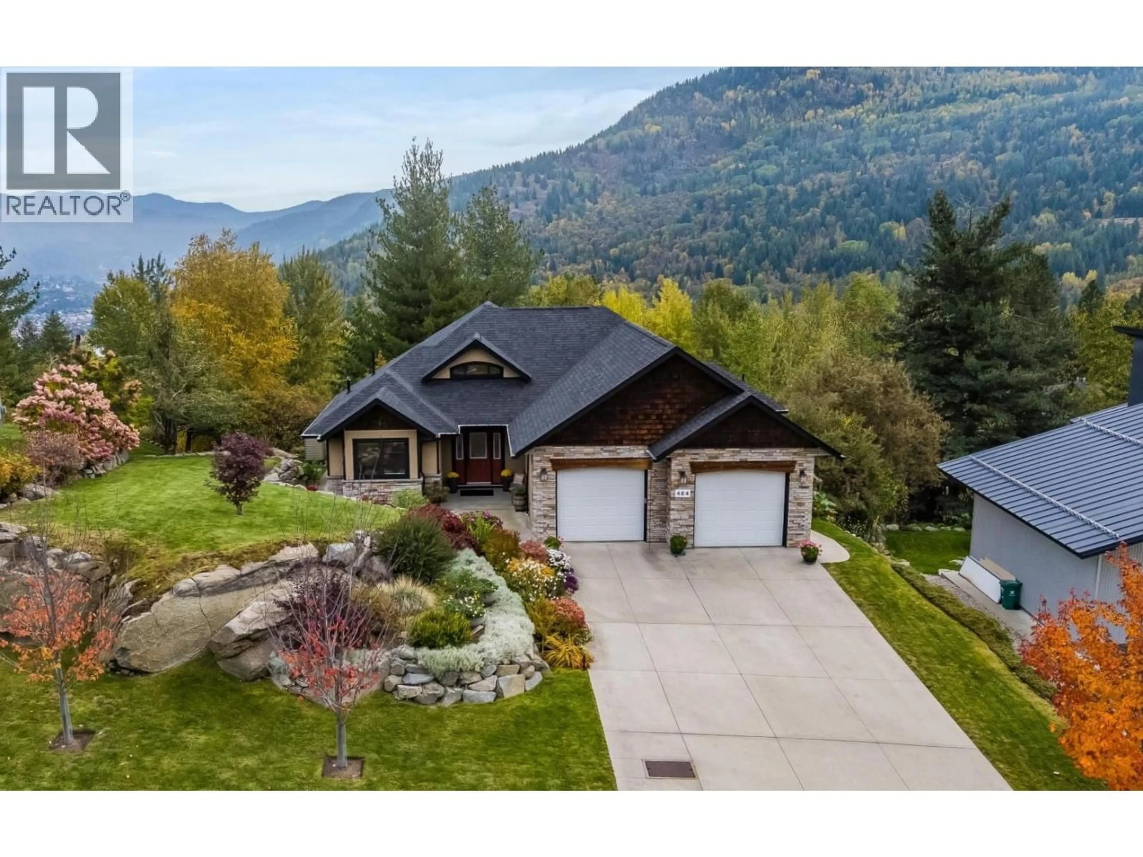 A pic from outside/outdoor area/front of a property/back of a property/a pic from drone, mountain view for 464 WHITMAN WAY, Warfield British Columbia V1R4T9