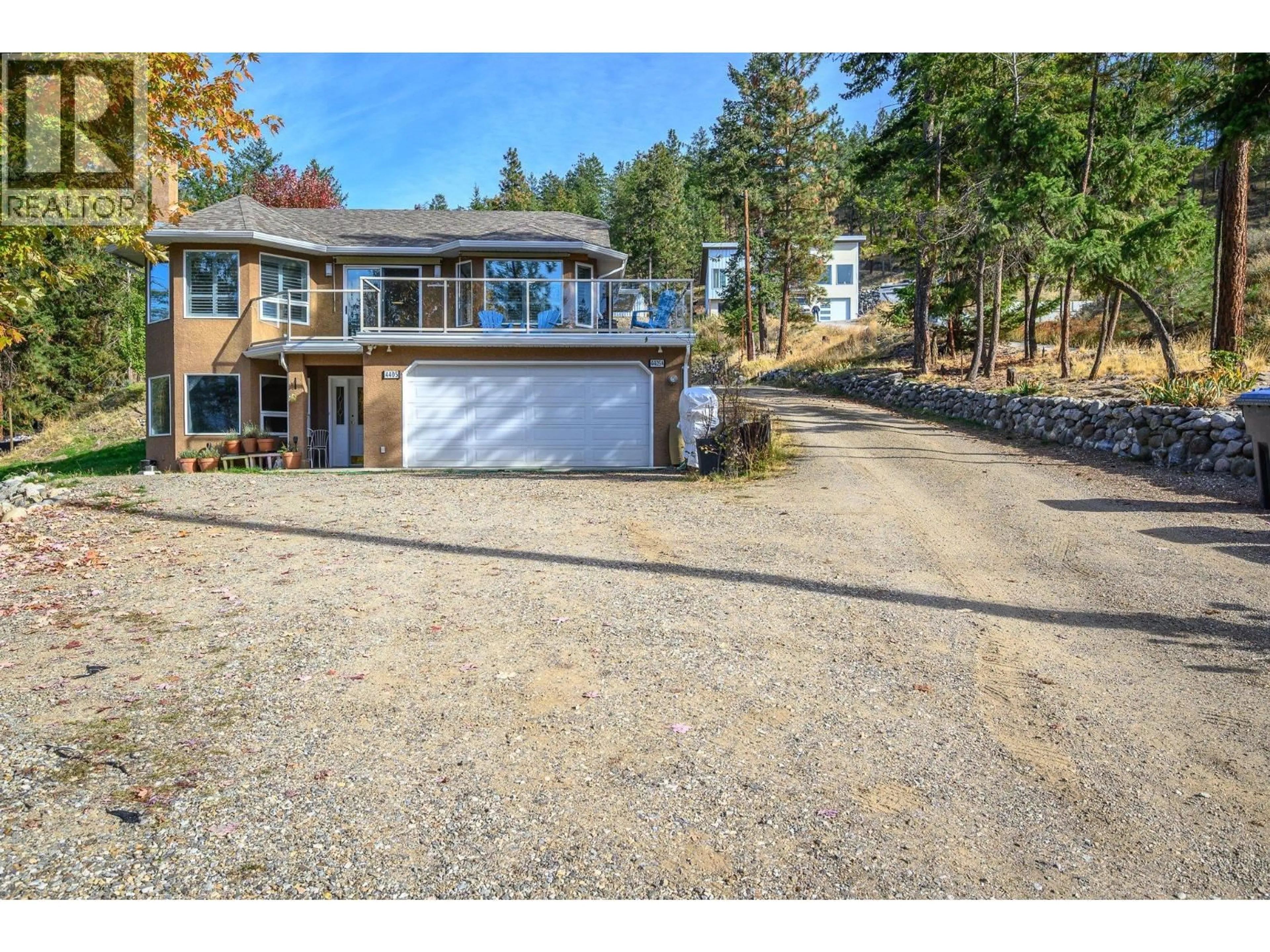A pic from outside/outdoor area/front of a property/back of a property/a pic from drone, street for 4405 OTTLEY ROAD, Lake Country British Columbia V4V1N1