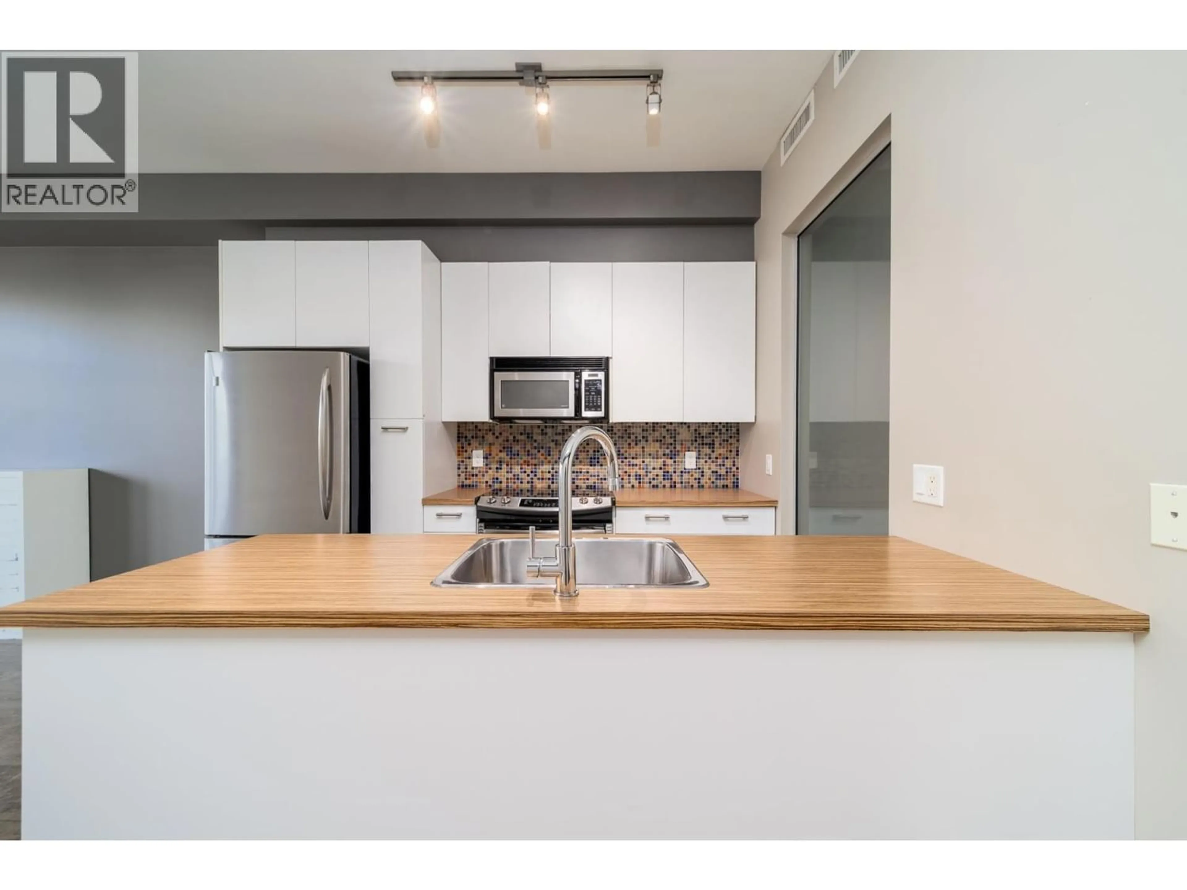 Unknown for 216 - 1289 ELLIS STREET, Kelowna British Columbia V1Y9X6
