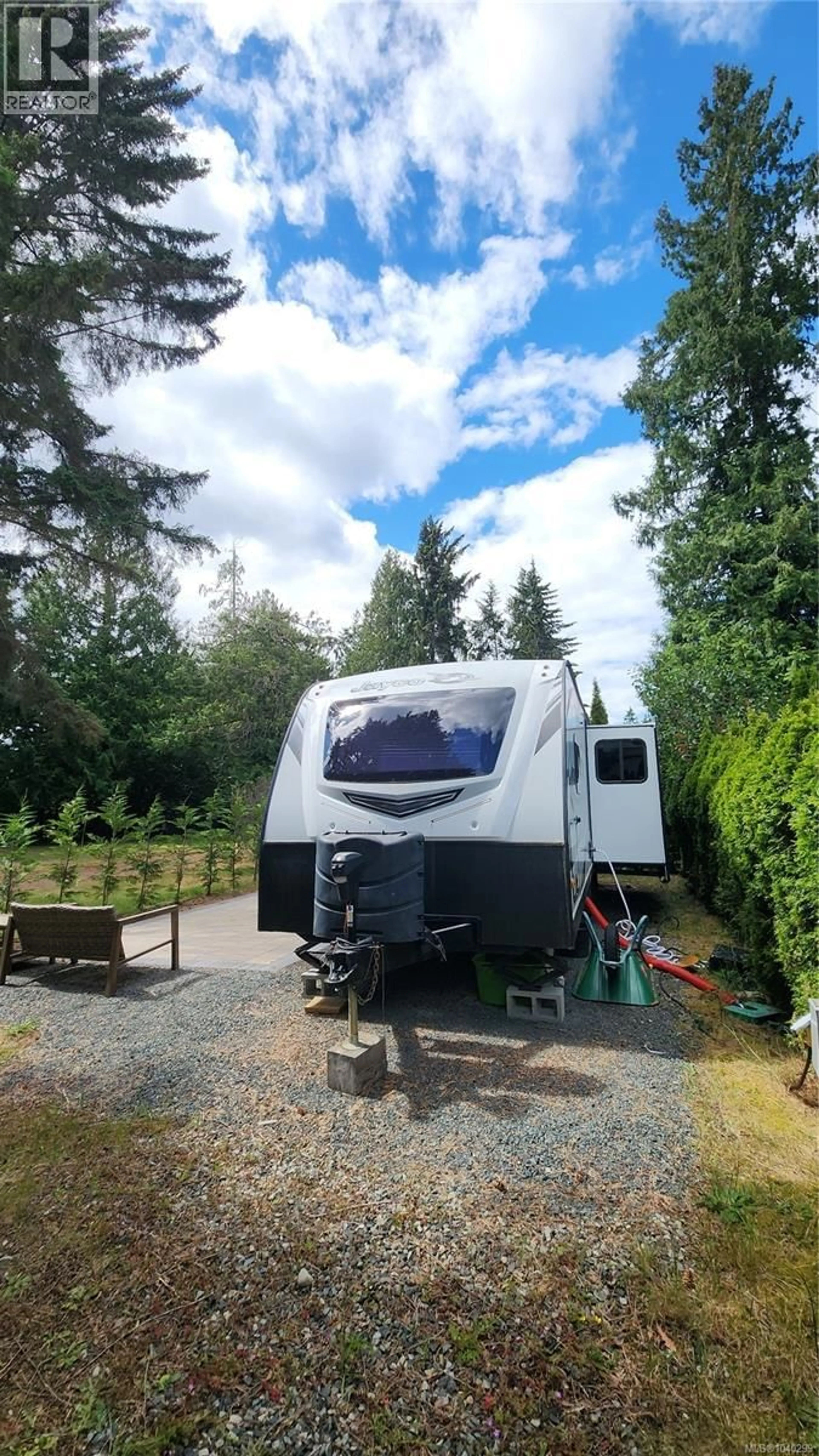 A pic from outside/outdoor area/front of a property/back of a property/a pic from drone, street for 34 - 6050 ISLAND HIGHWAY WEST, Qualicum Beach British Columbia V9K2E1