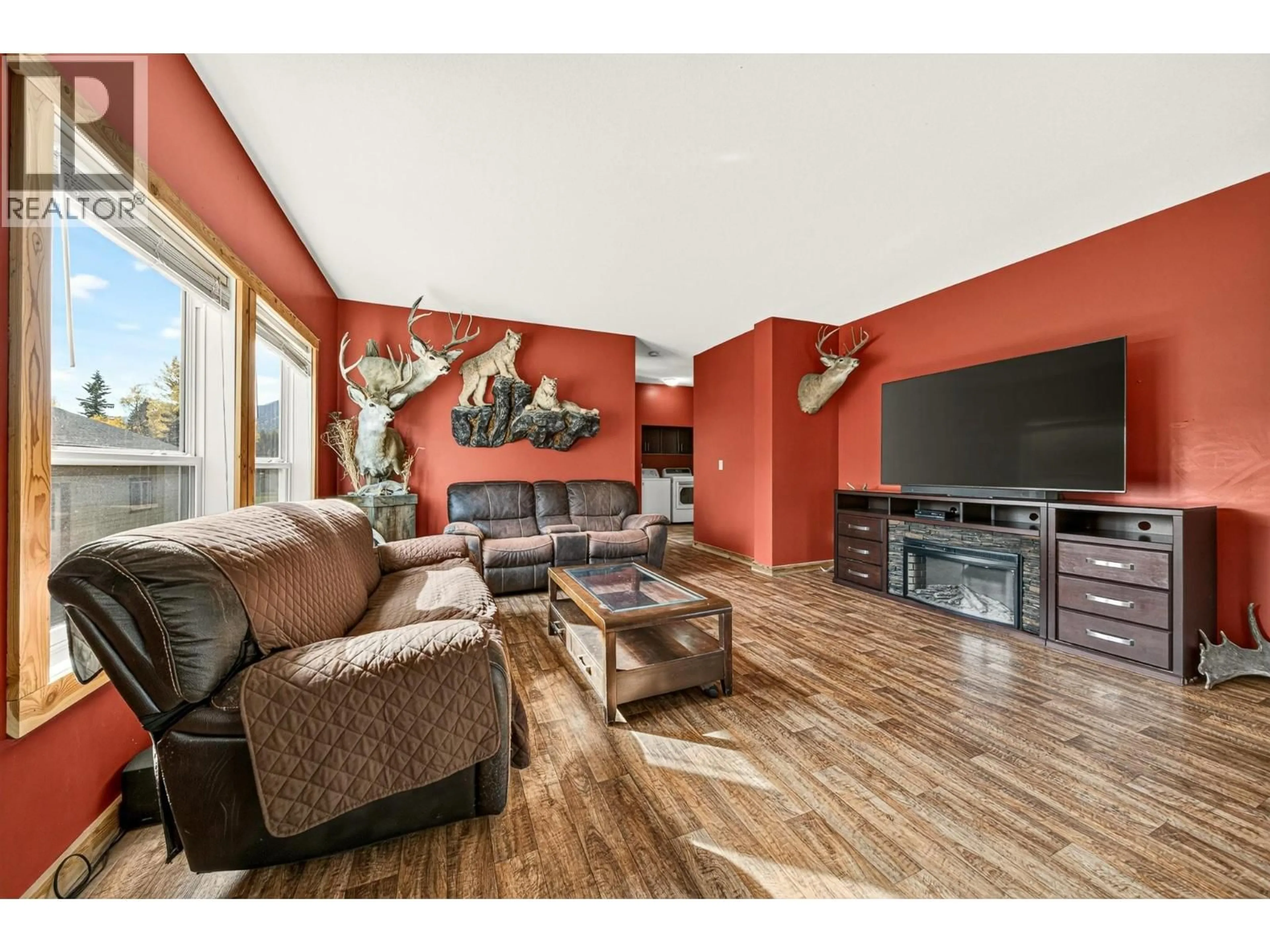 Living room with furniture, wood/laminate floor for 6281 LOWER ELK VALLEY ROAD, Sparwood British Columbia V0B2G3