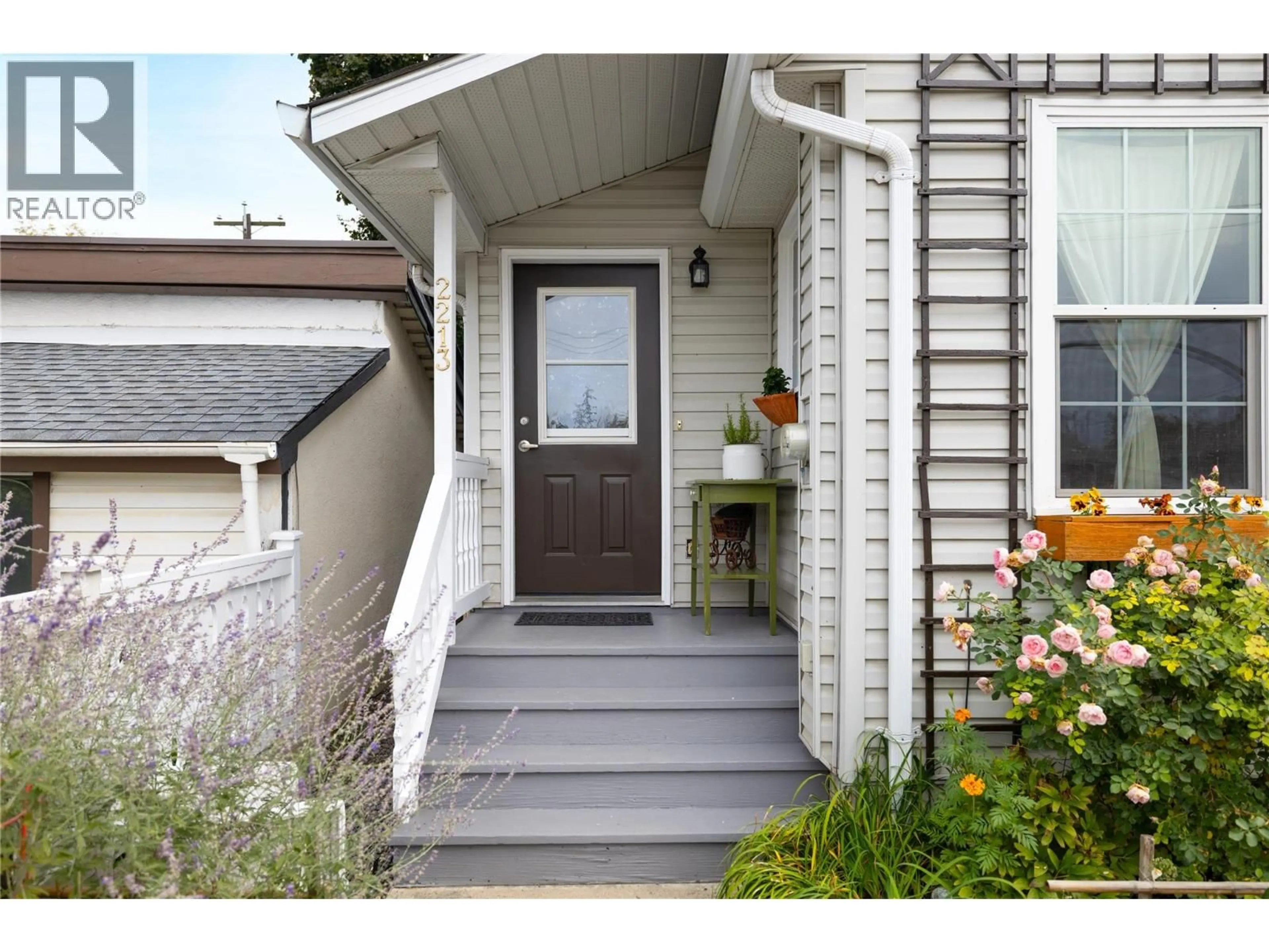 Home with vinyl exterior material, street for 2213 33 STREET, Vernon British Columbia V1T5S2