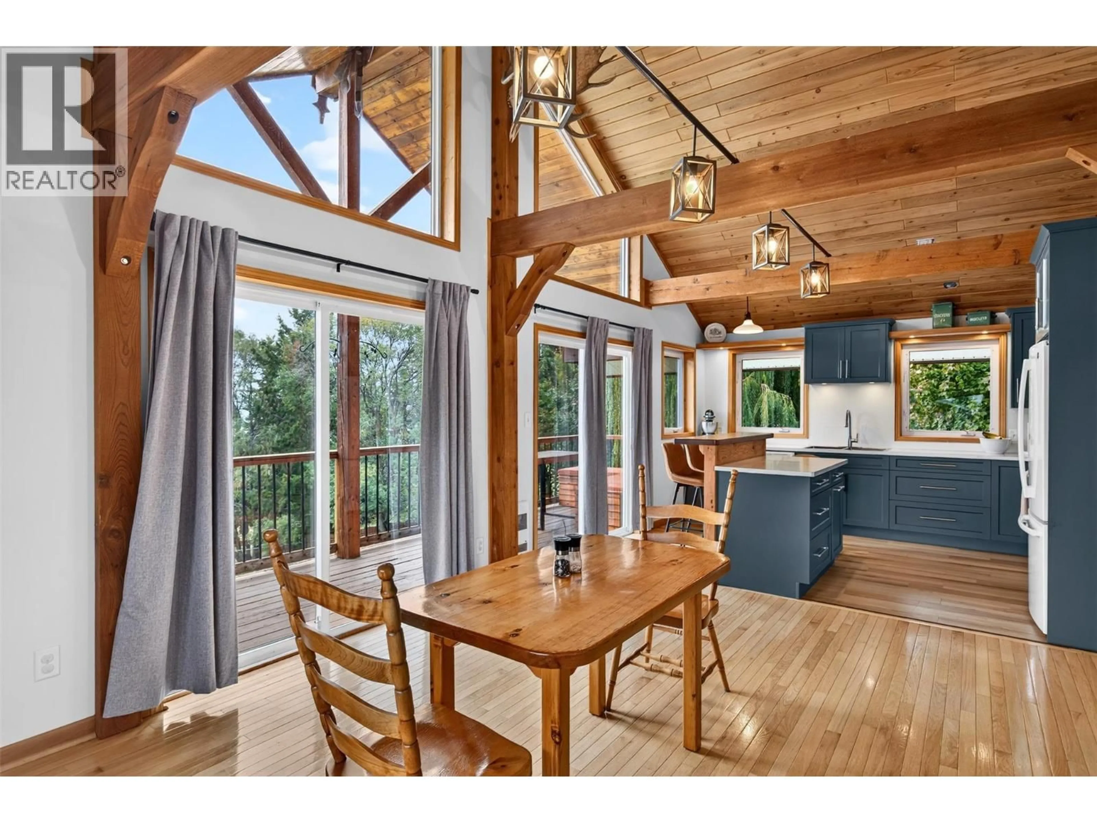 Open concept kitchen, wood/laminate floor for 359 KILDARE WAY, Vernon British Columbia V1H2C7