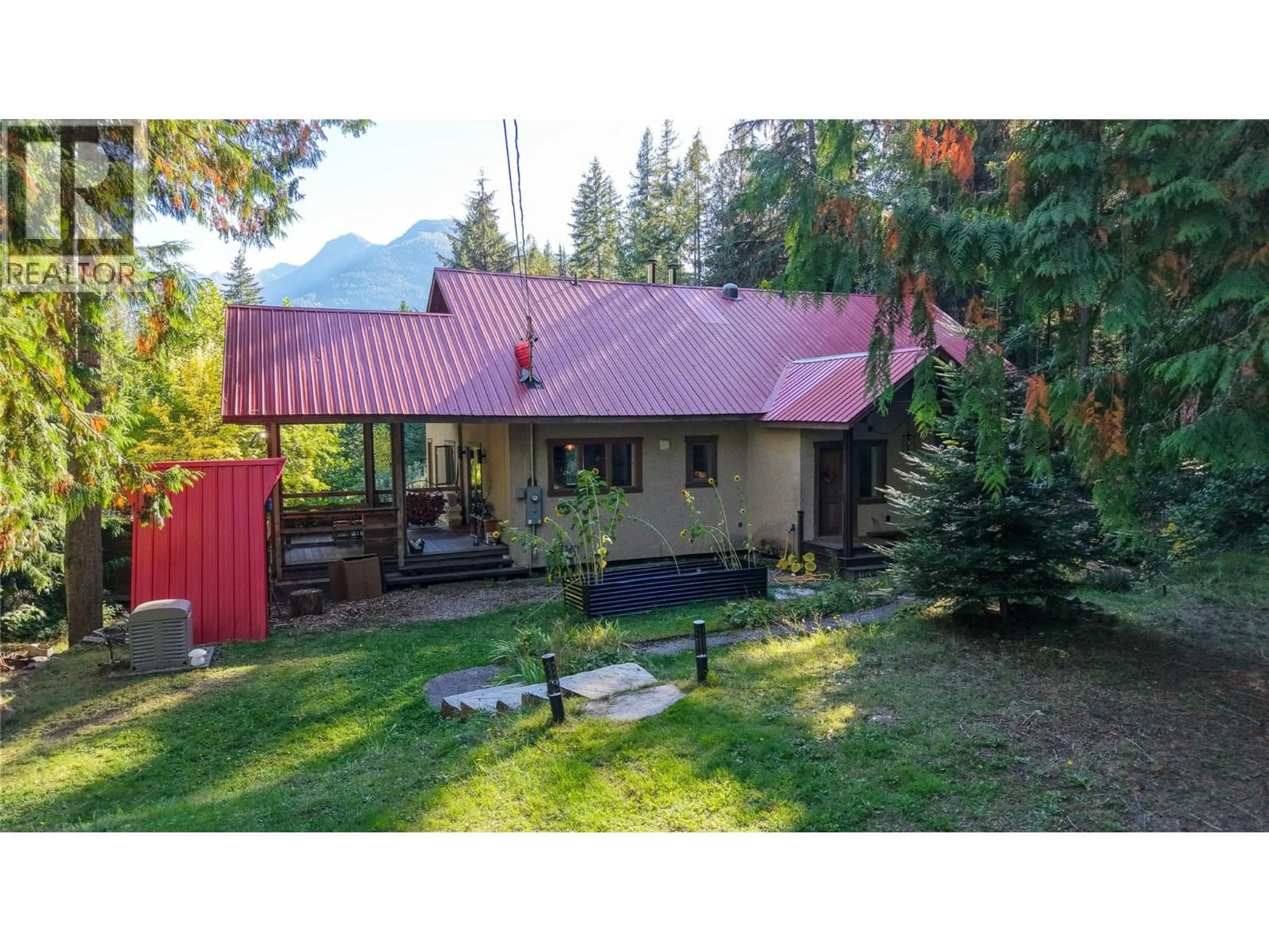A pic from outside/outdoor area/front of a property/back of a property/a pic from drone, mountain view for 7025 BEGGS ROAD, Nelson British Columbia V1L5P6