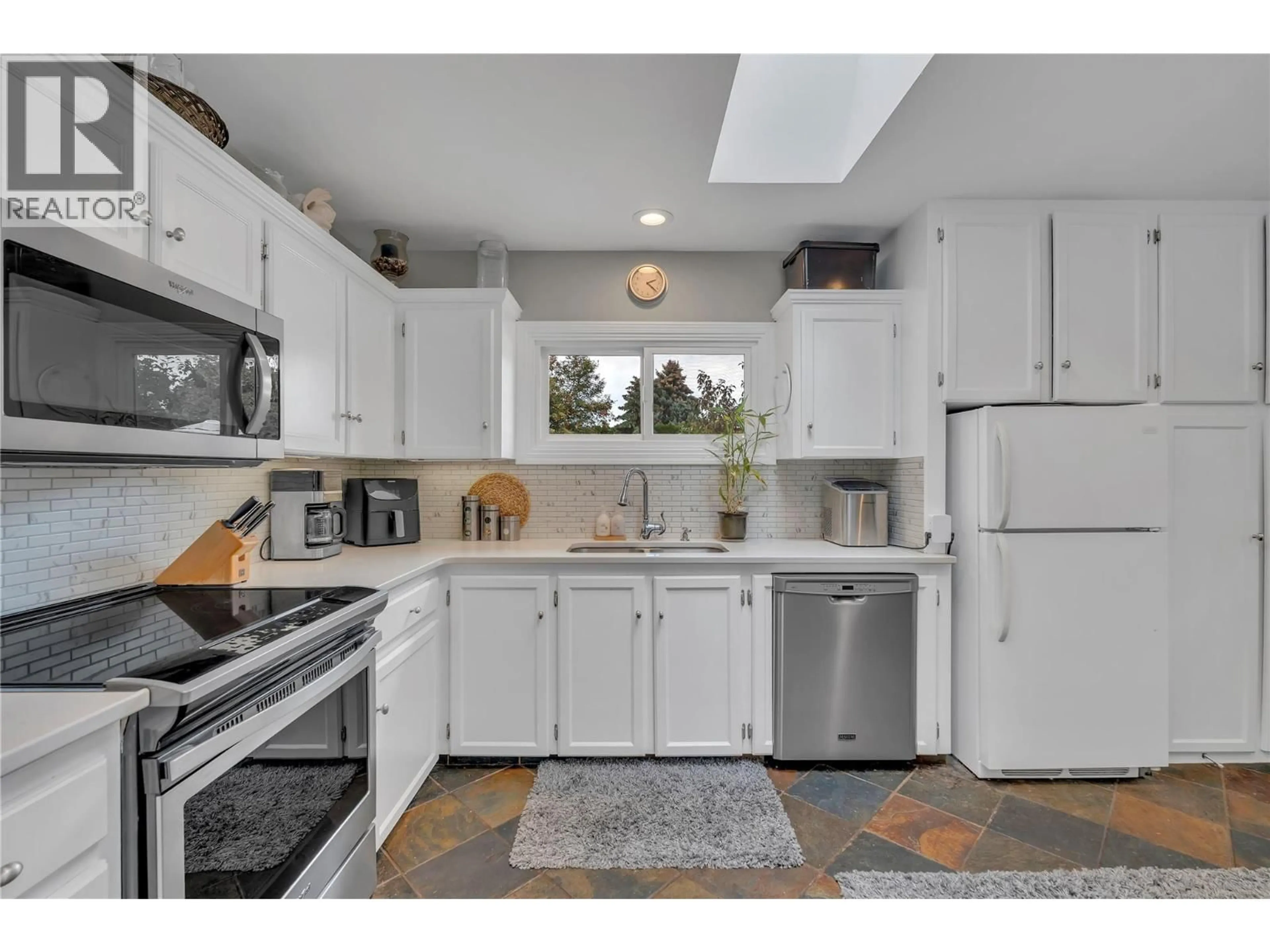 Standard kitchen, ceramic/tile floor for 11114 PRAIRIE VALLEY ROAD, Summerland British Columbia V0H1Z8