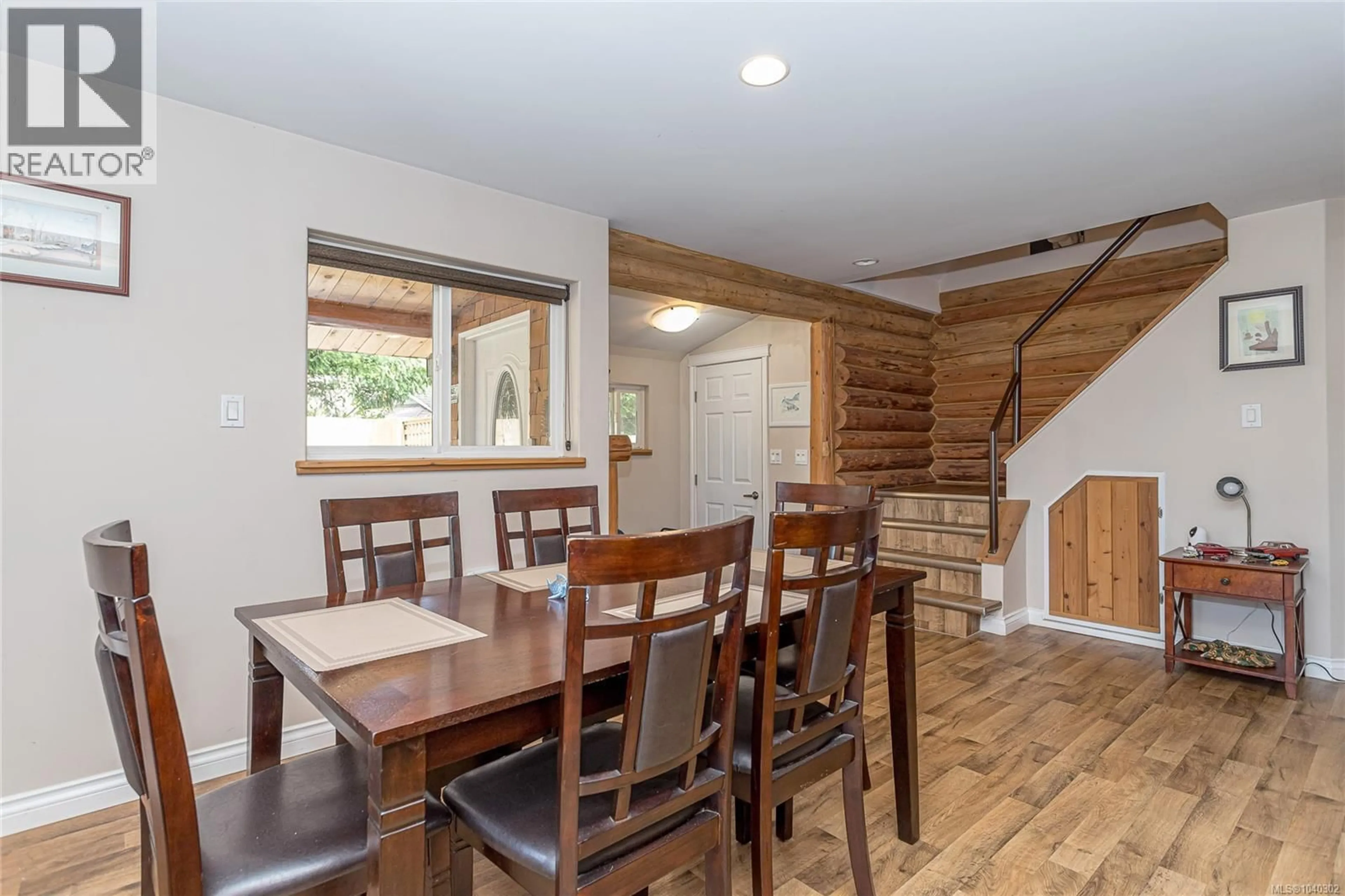 Dining room, wood/laminate floor for 70 ISLEWOOD DRIVE, Bowser British Columbia V0R1G0