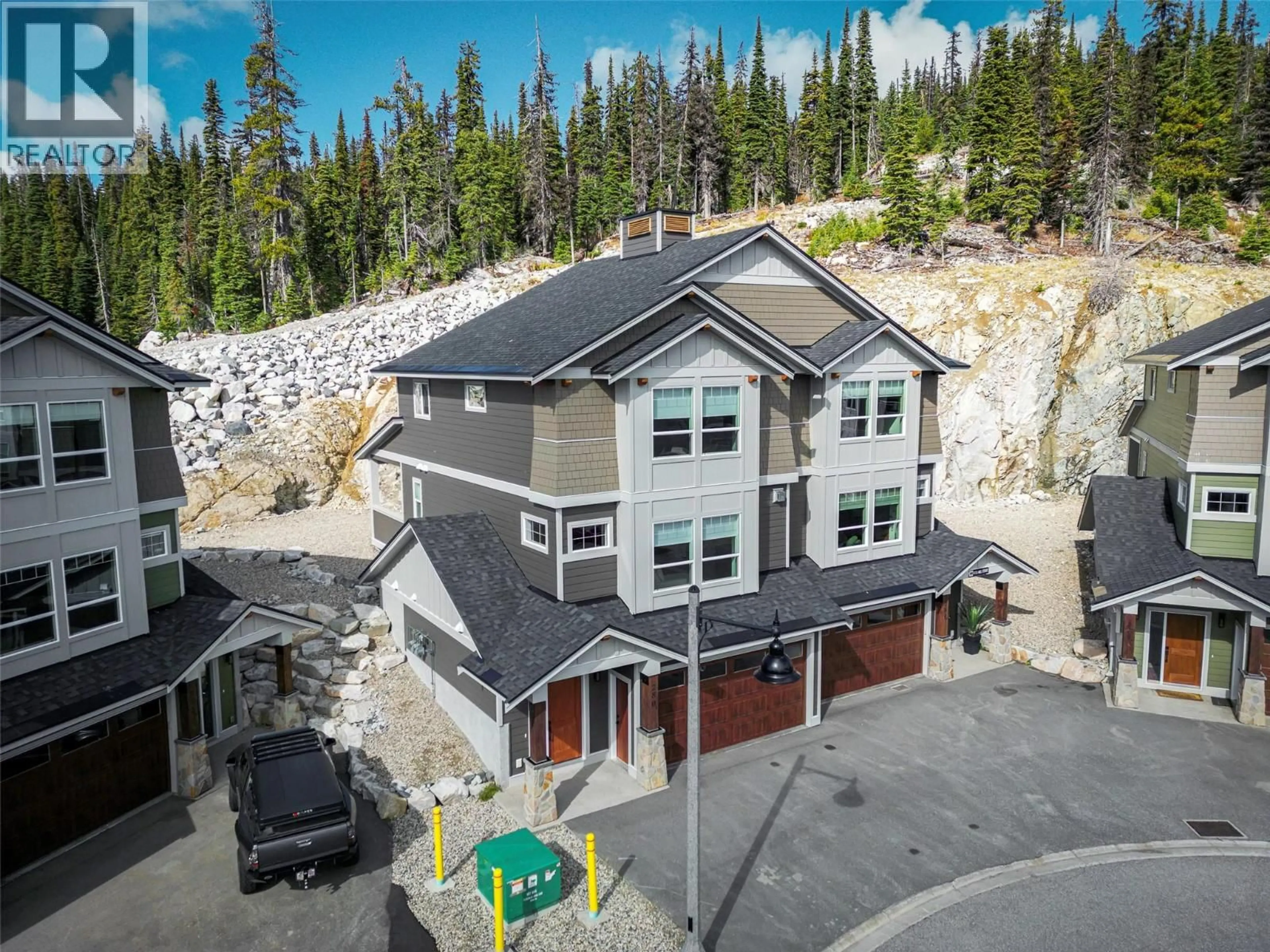 A pic from outside/outdoor area/front of a property/back of a property/a pic from drone, mountain view for 280B GRIZZLY RIDGE TRAIL, Big White British Columbia V1P1T4