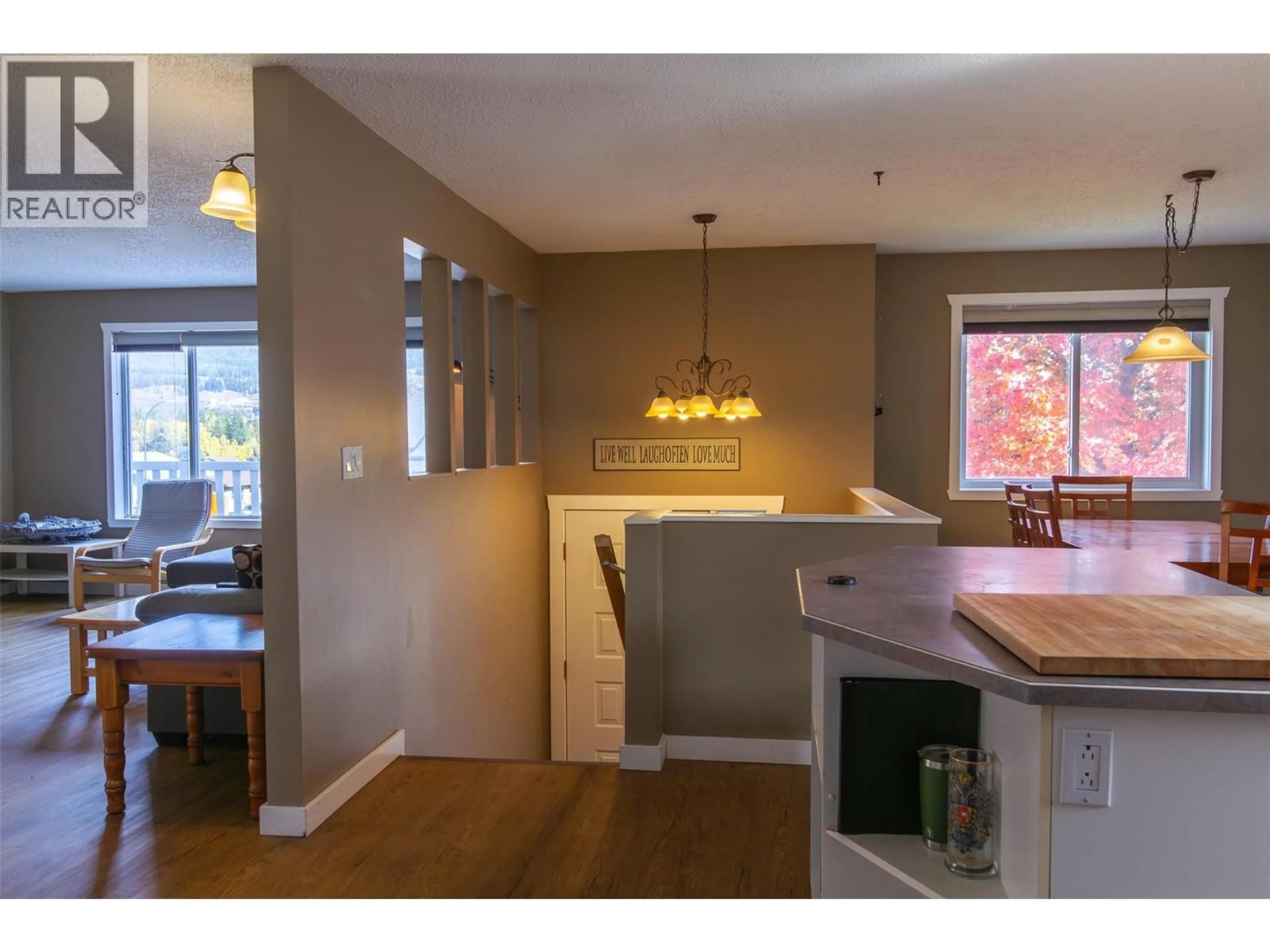 Open concept kitchen, wood/laminate floor for 1207 PINYON ROAD, Sparwood British Columbia V0B2G2