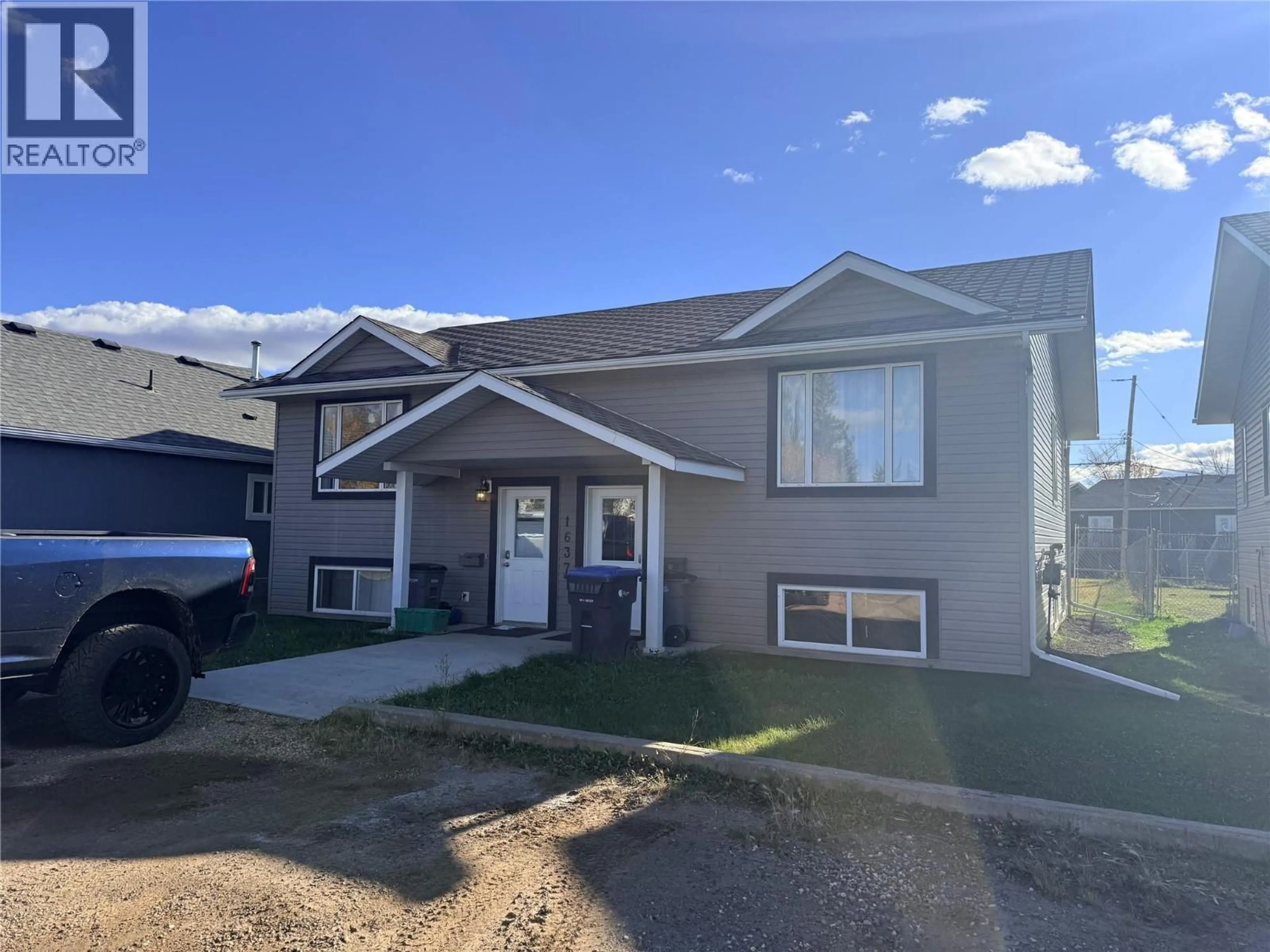 Home with vinyl exterior material, street for 1637 100 AVENUE, Dawson Creek British Columbia V1G1X3