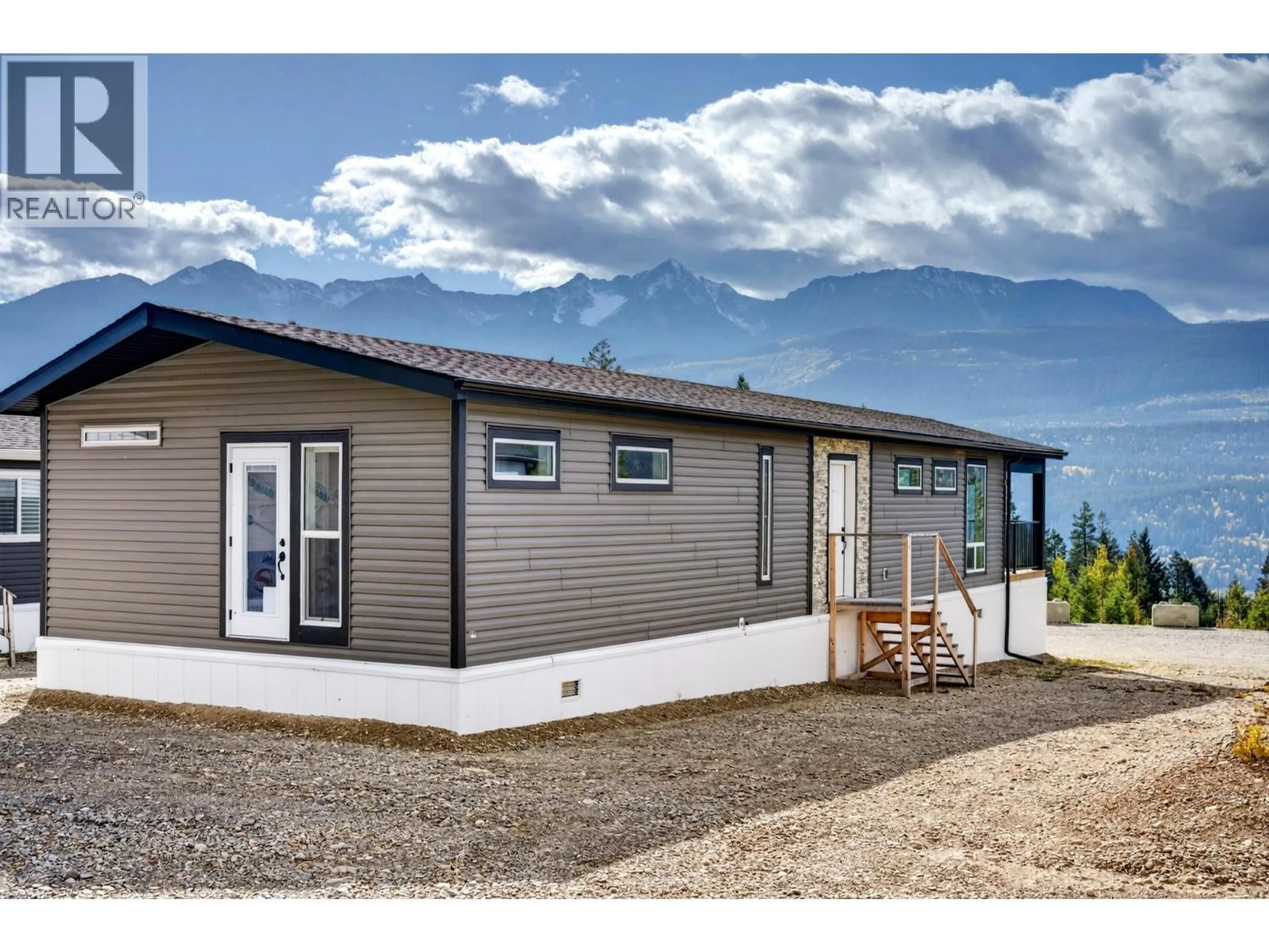 Home with vinyl exterior material, mountain view for 46 - 470 REFLECTION LAKE ROAD, Golden British Columbia V0A1H6