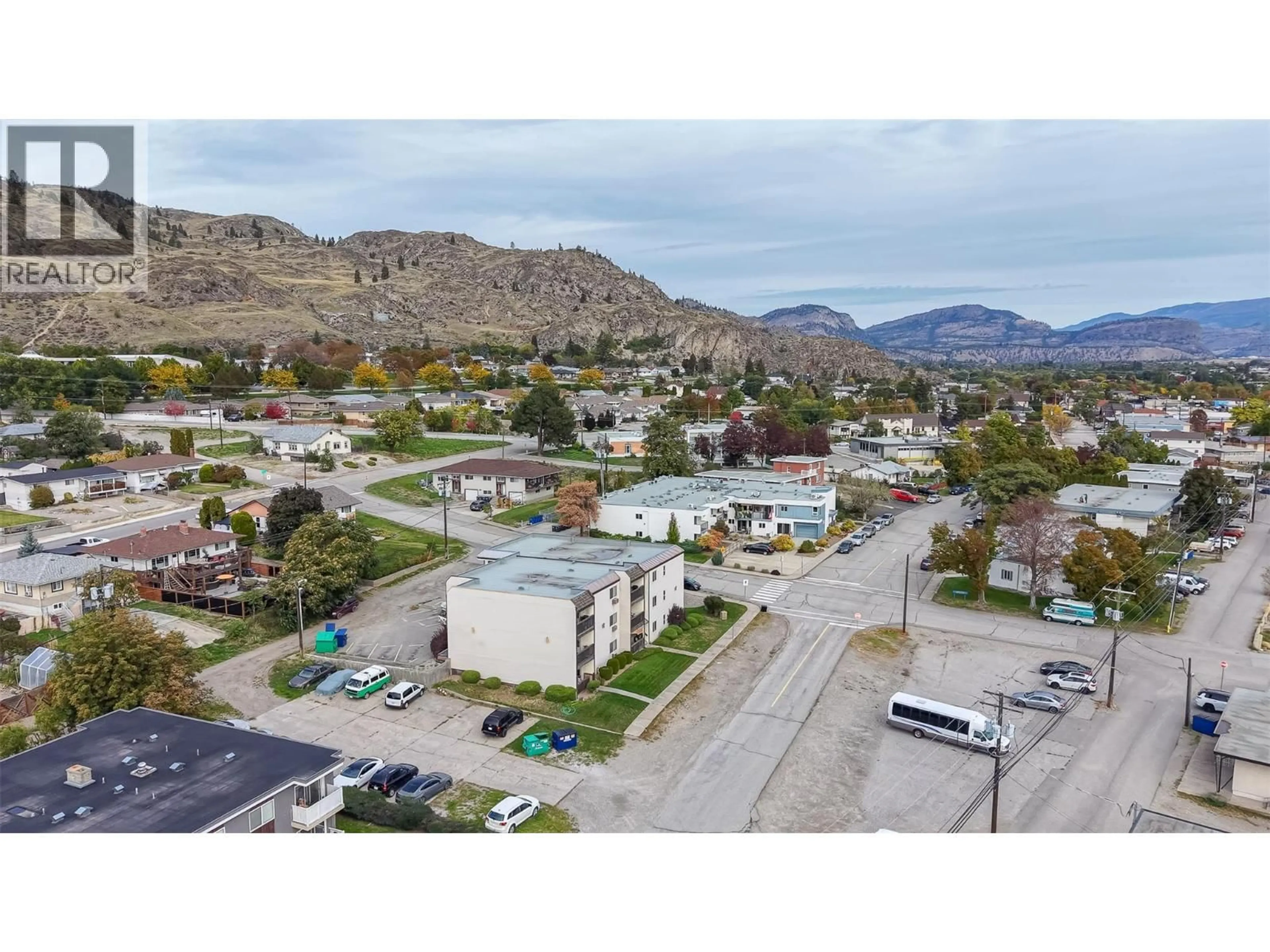 A pic from outside/outdoor area/front of a property/back of a property/a pic from drone, mountain view for 10 - 529 CO-OP AVENUE, Oliver British Columbia V0H1T0