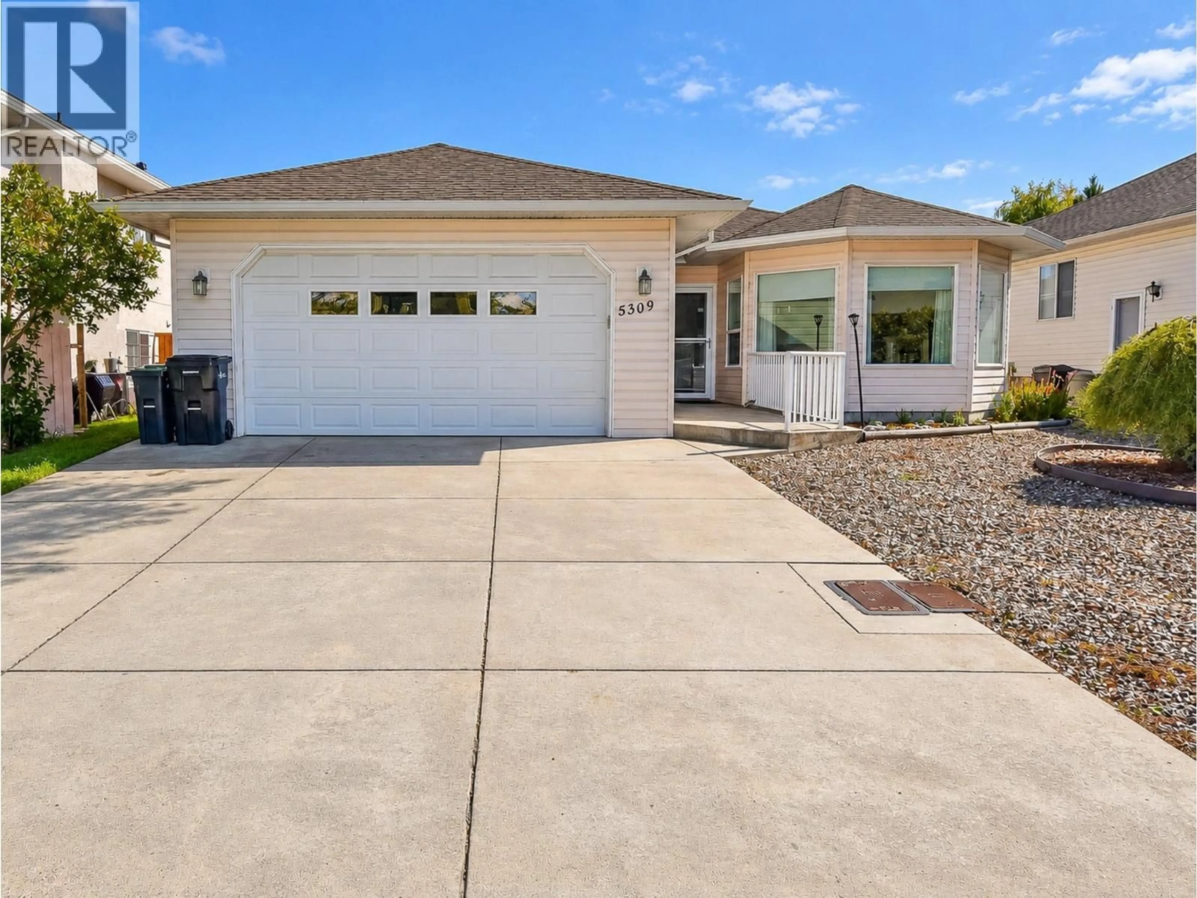 Home with vinyl exterior material, street for 5309 21 STREET, Vernon British Columbia V1T9N2