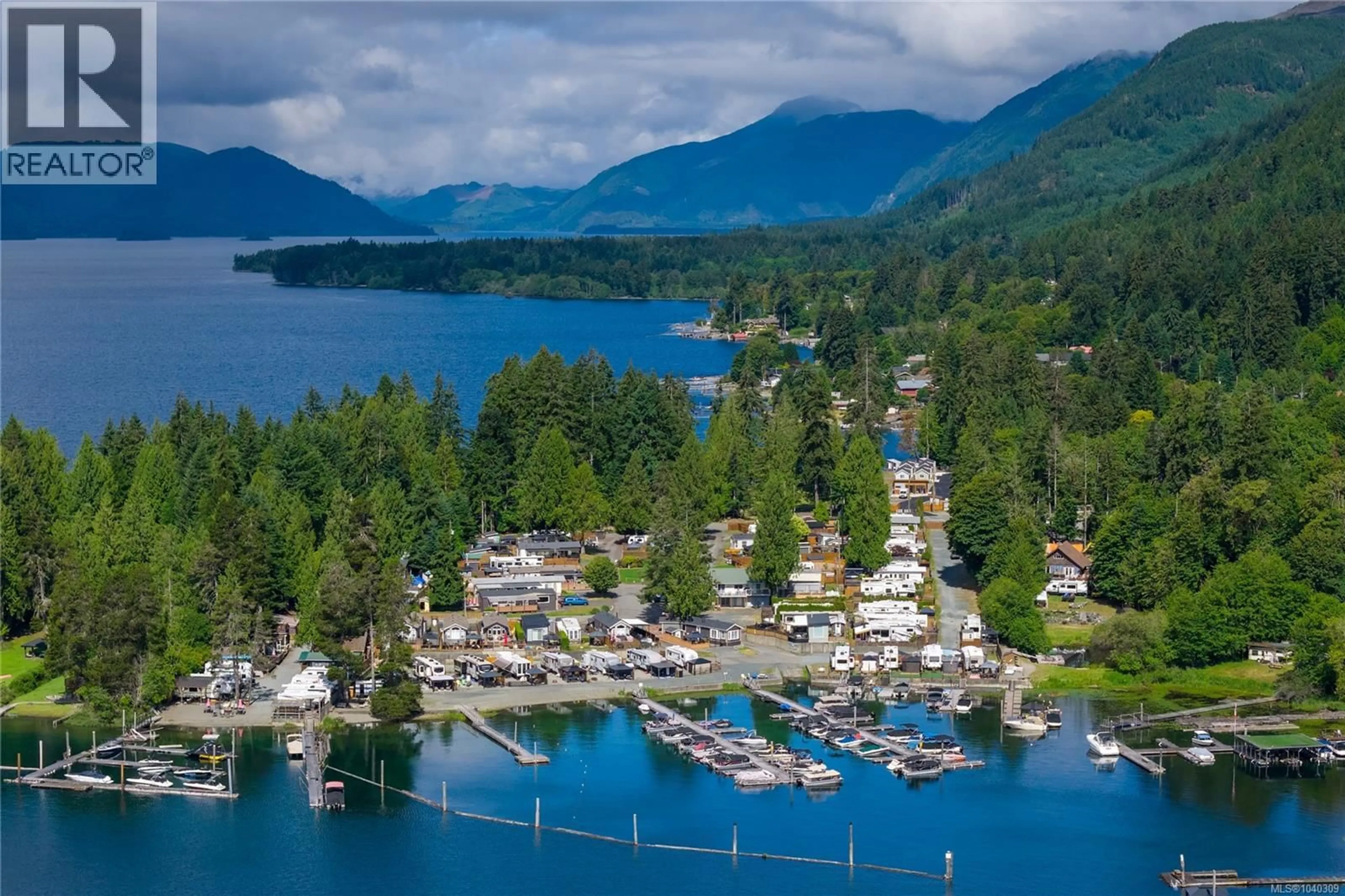 A pic from outside/outdoor area/front of a property/back of a property/a pic from drone, water/lake/river/ocean view for 4A - 8389 SA-SEEN-OS ROAD, Youbou British Columbia V0R3E1