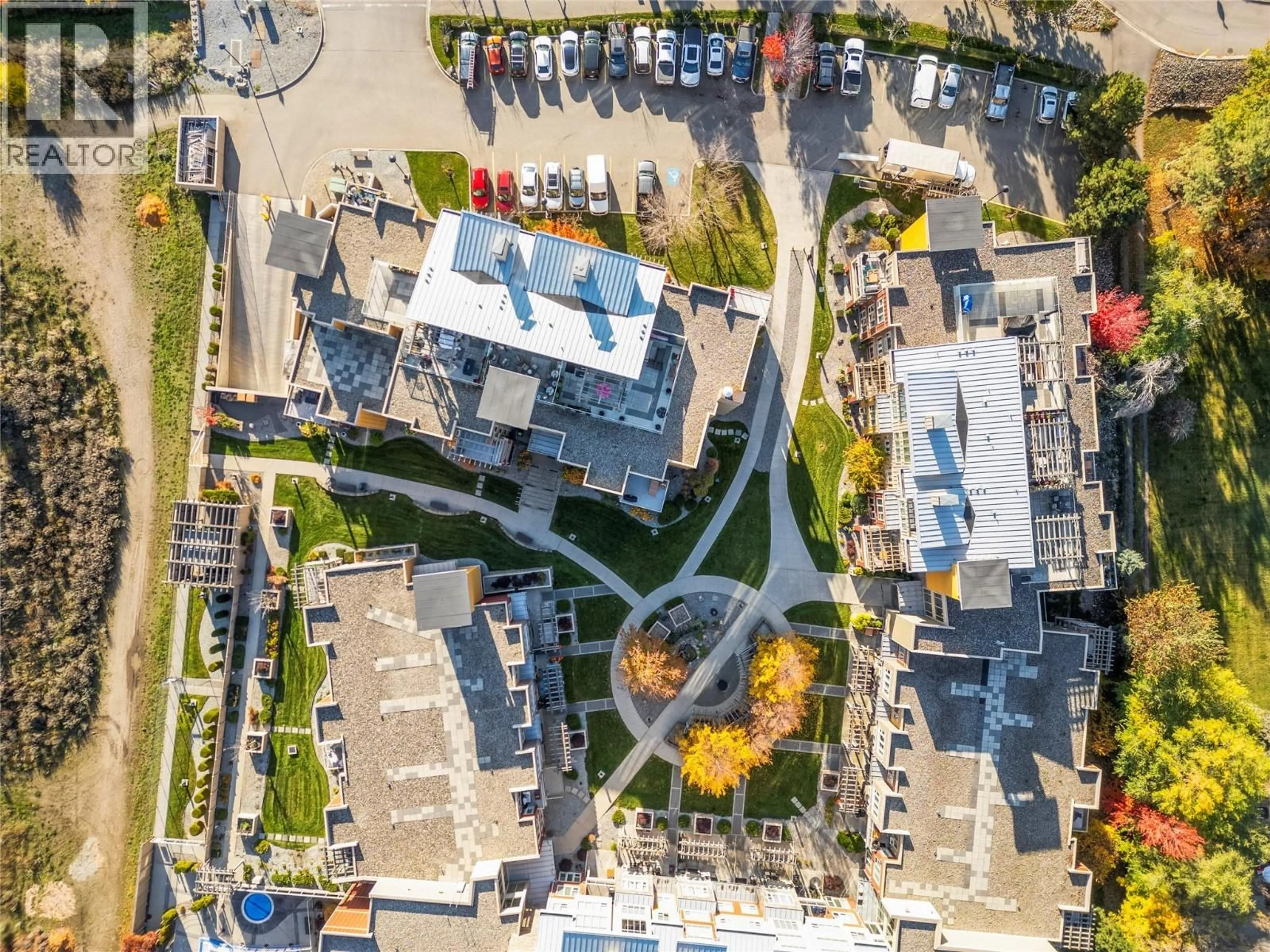 A pic from outside/outdoor area/front of a property/back of a property/a pic from drone, city buildings view from balcony for 1132 - 7343 OKANAGAN LANDING ROAD, Vernon British Columbia V1H2J6