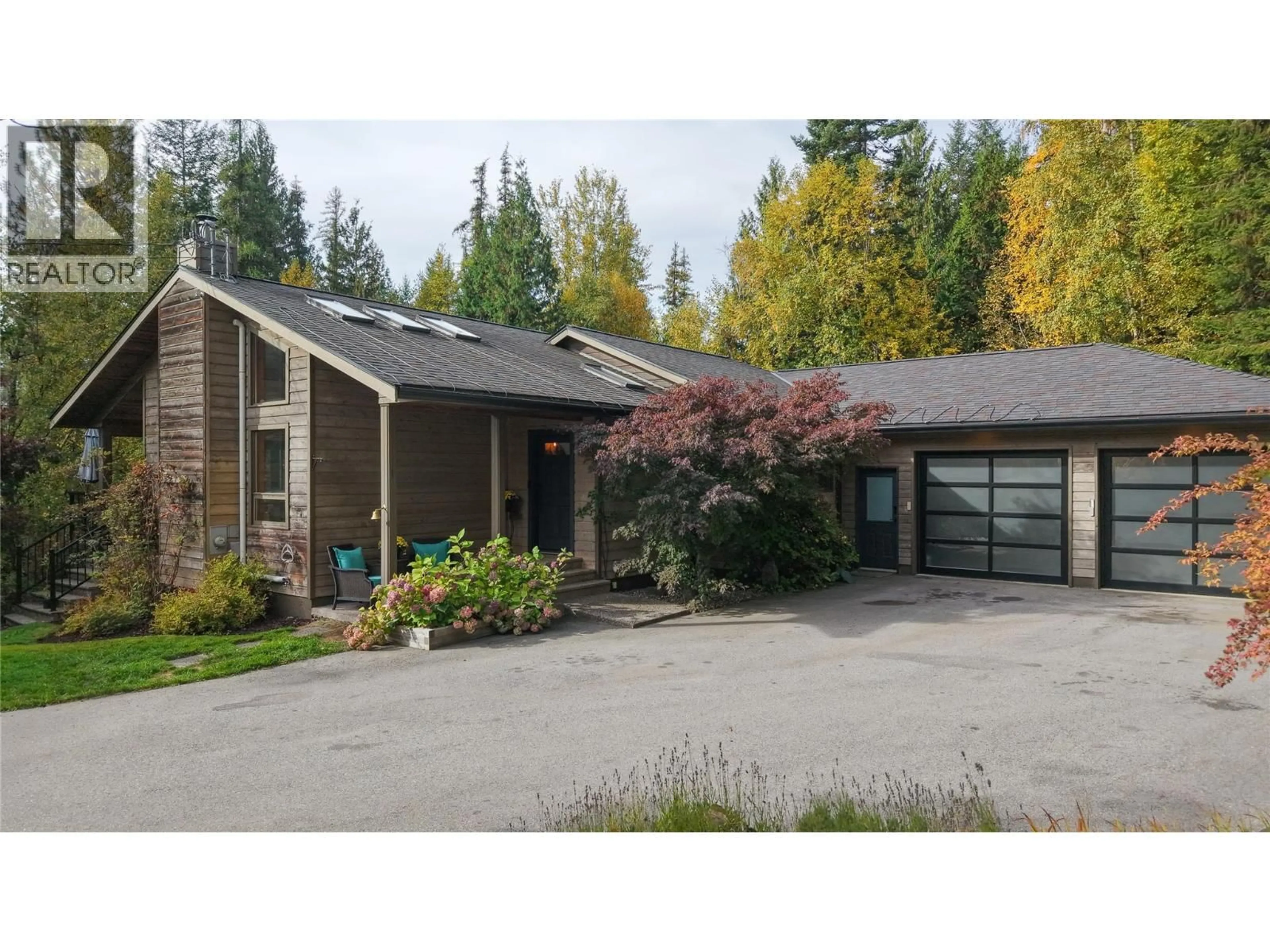Home with vinyl exterior material, street for 3795 AARON ROAD, Bonnington British Columbia V0G2G3