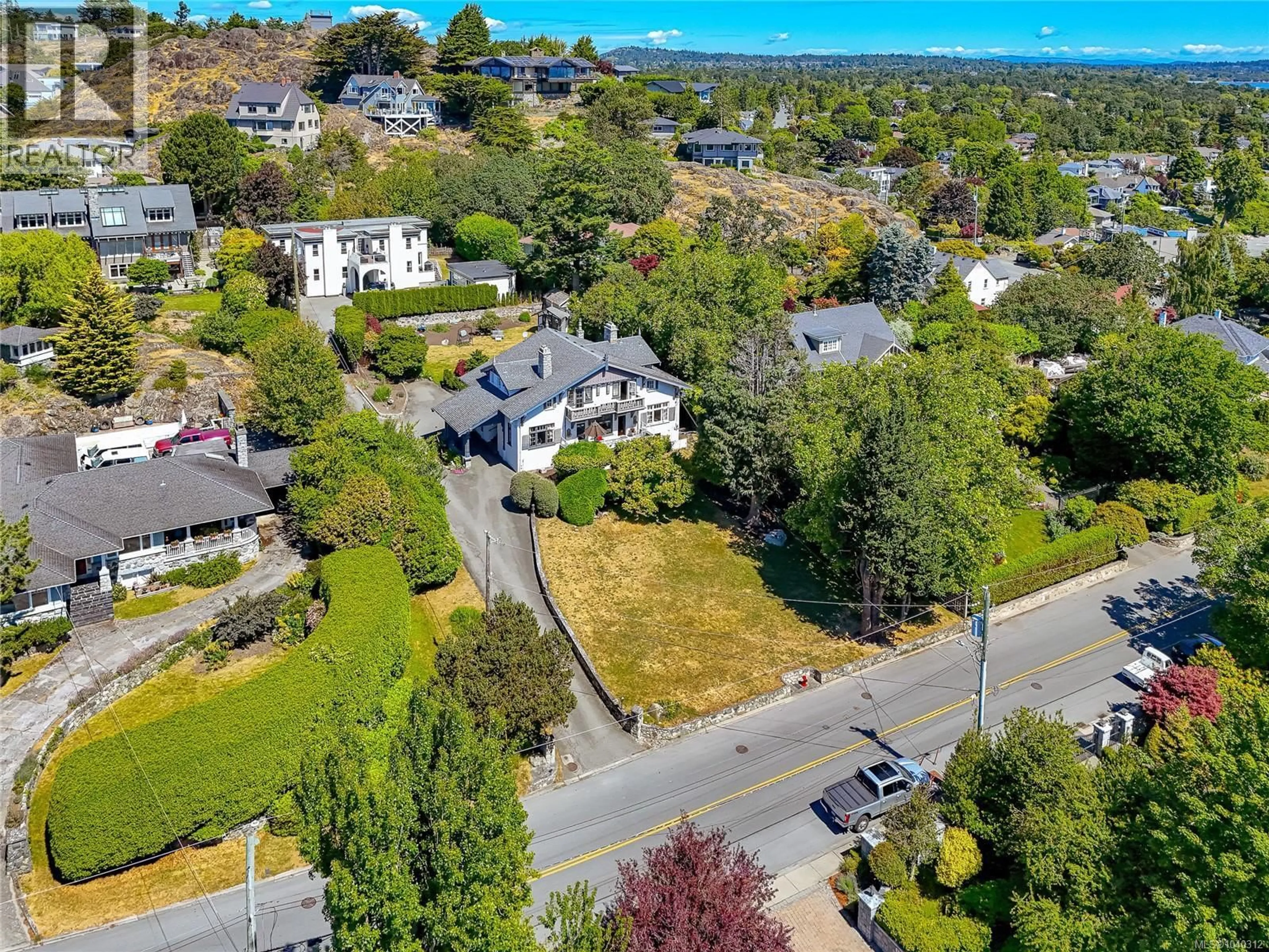 A pic from outside/outdoor area/front of a property/back of a property/a pic from drone, water/lake/river/ocean view for 250 KING GEORGE TERRACE, Oak Bay British Columbia V8S2K2