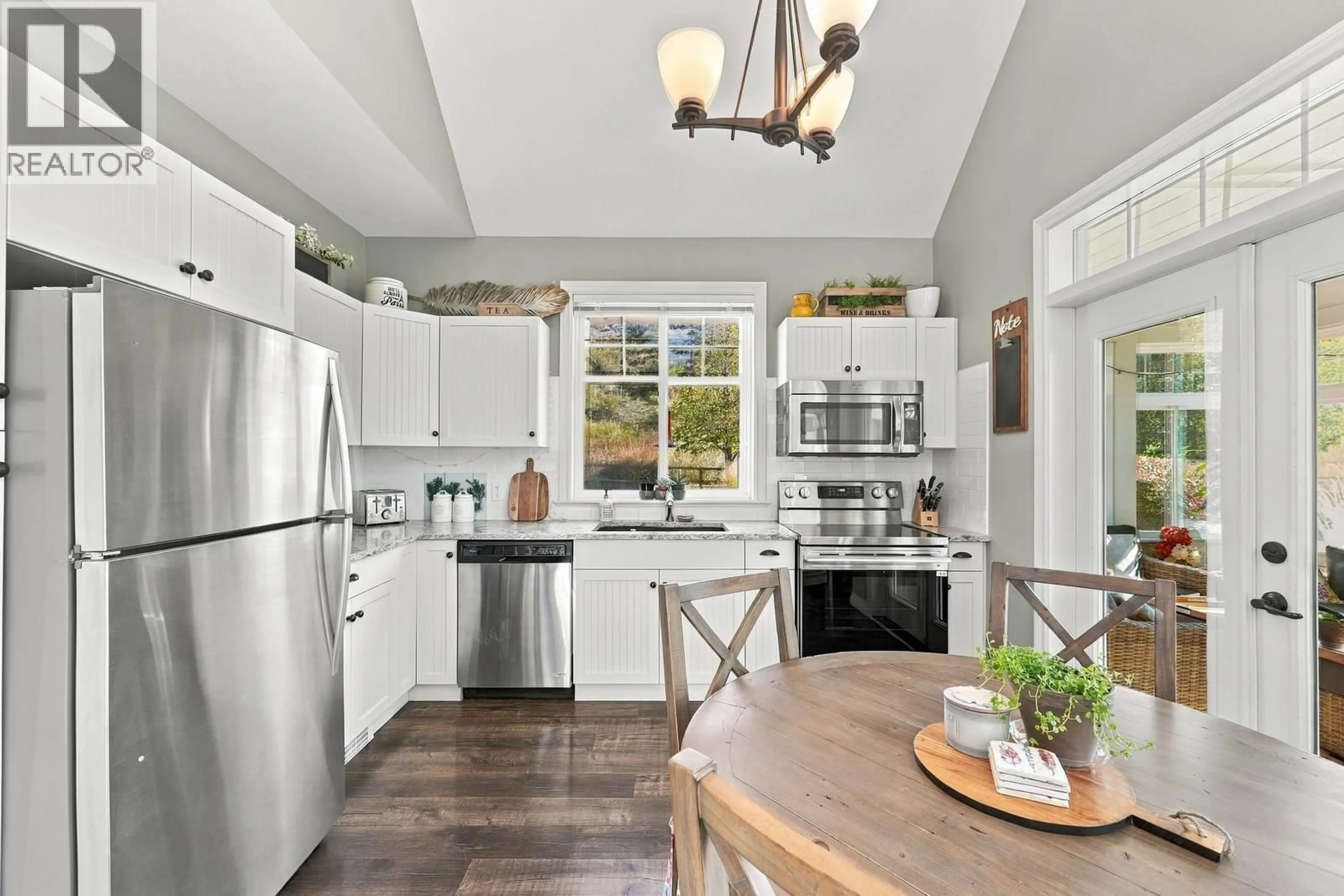 Open concept kitchen, ceramic/tile floor for 115 - 2450 RADIO TOWER ROAD, Oliver British Columbia V0H1T1
