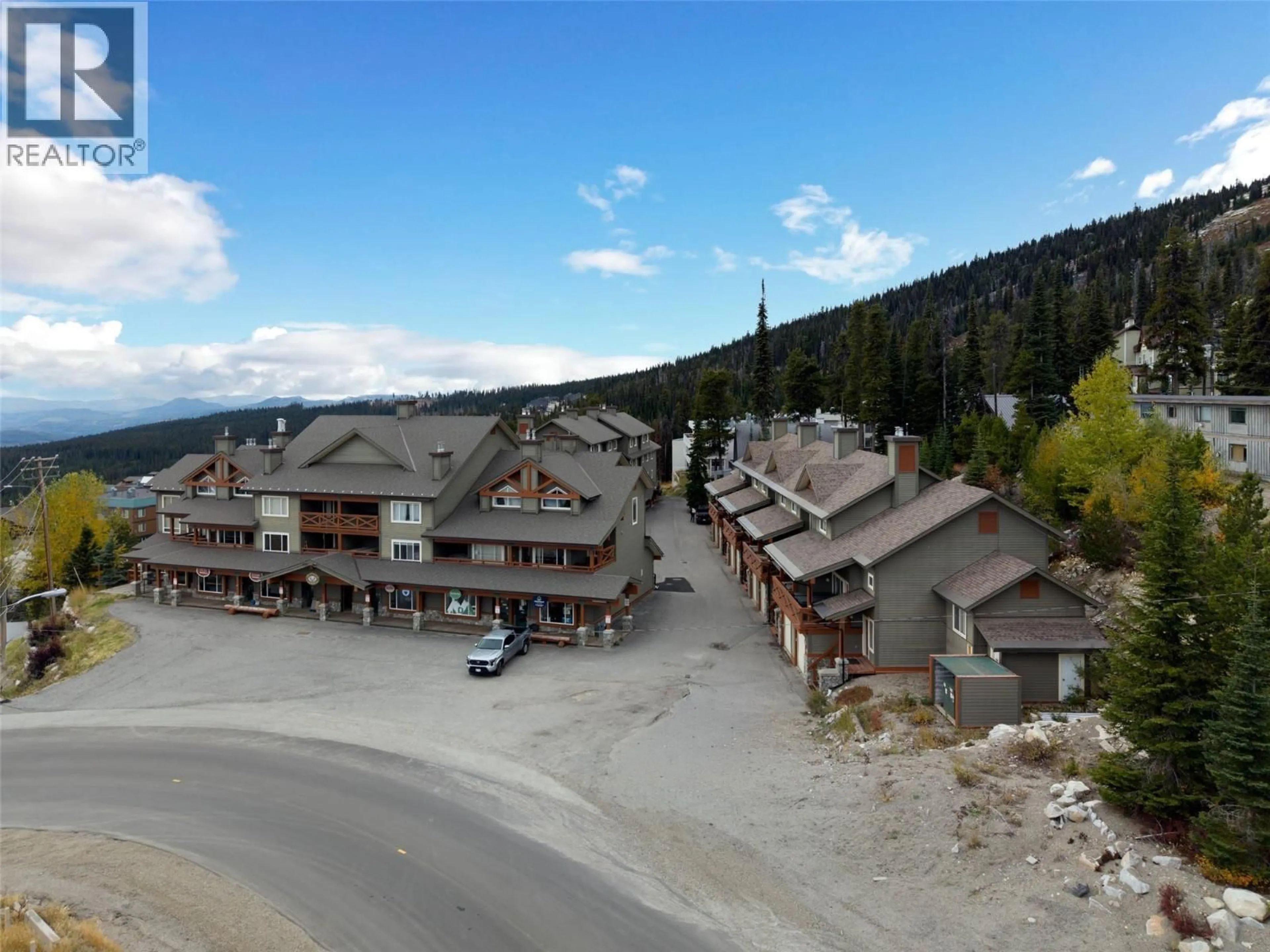 A pic from outside/outdoor area/front of a property/back of a property/a pic from drone, mountain view for 14 - 5350 BIG WHITE ROAD, Big White British Columbia V1P1P3