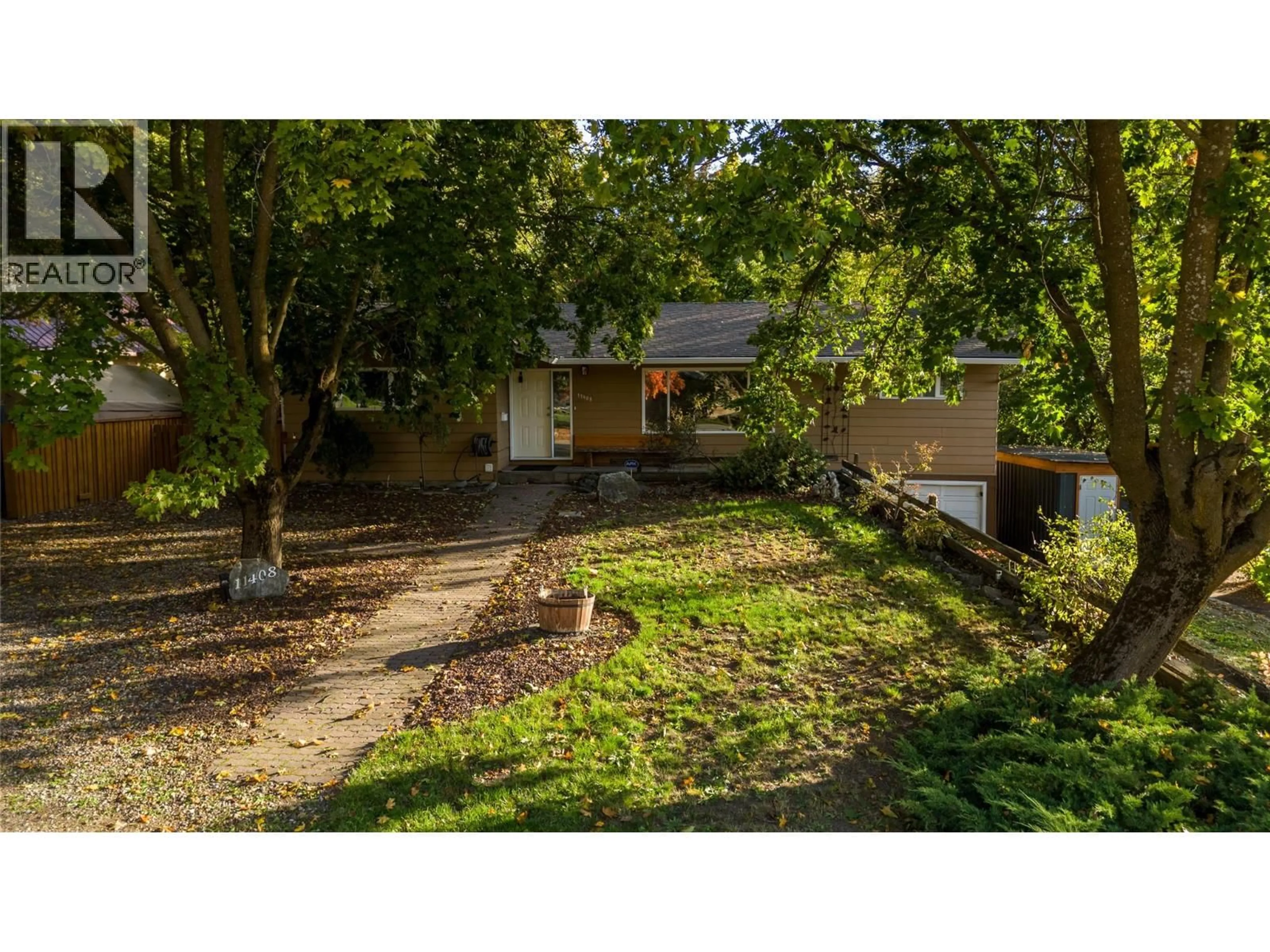 A pic from outside/outdoor area/front of a property/back of a property/a pic from drone, street for 11408 KALMALKA ROAD, Coldstream British Columbia V1B1M1
